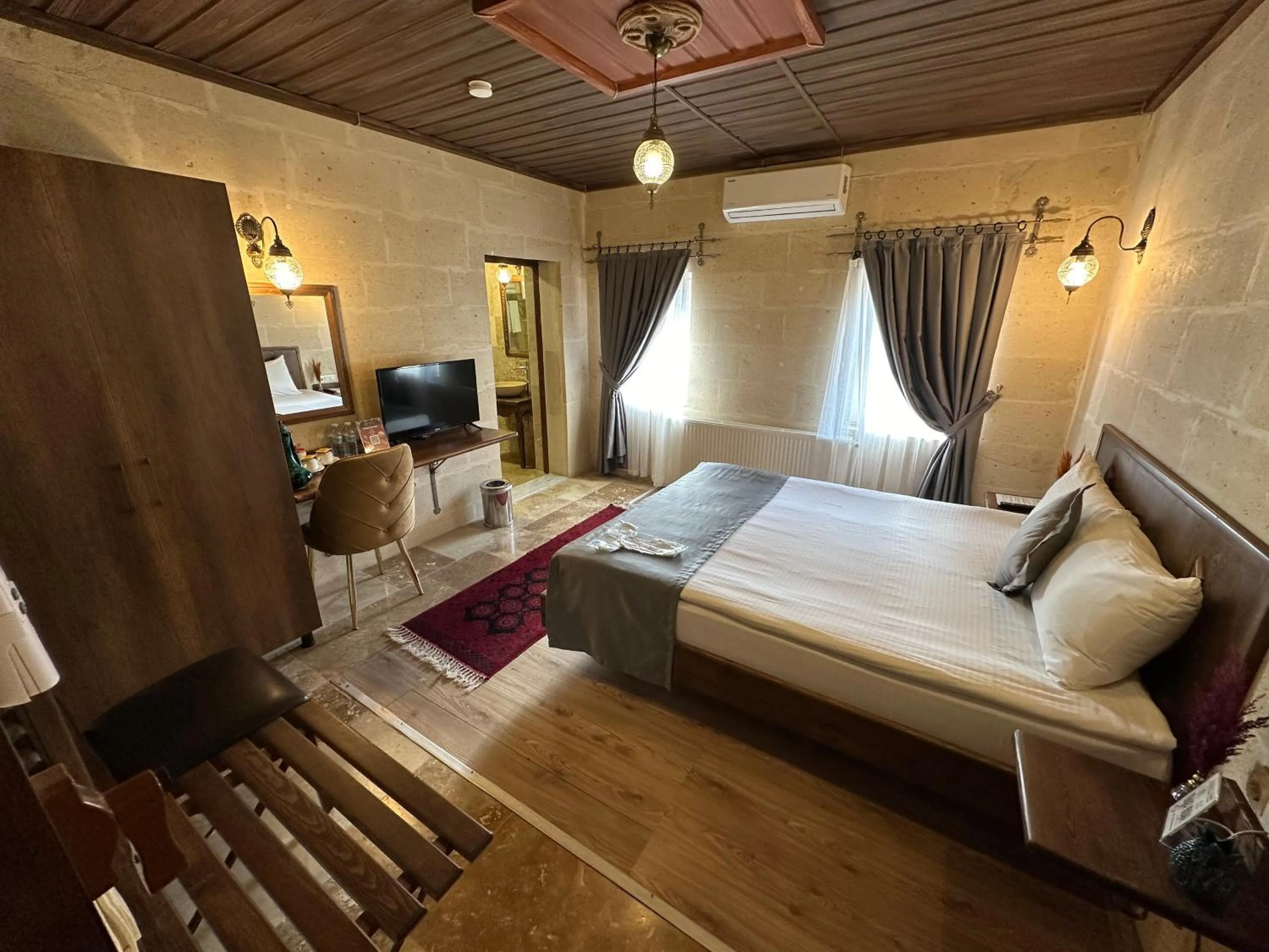 Bed in Virtus Cappadocia Hotel Göreme