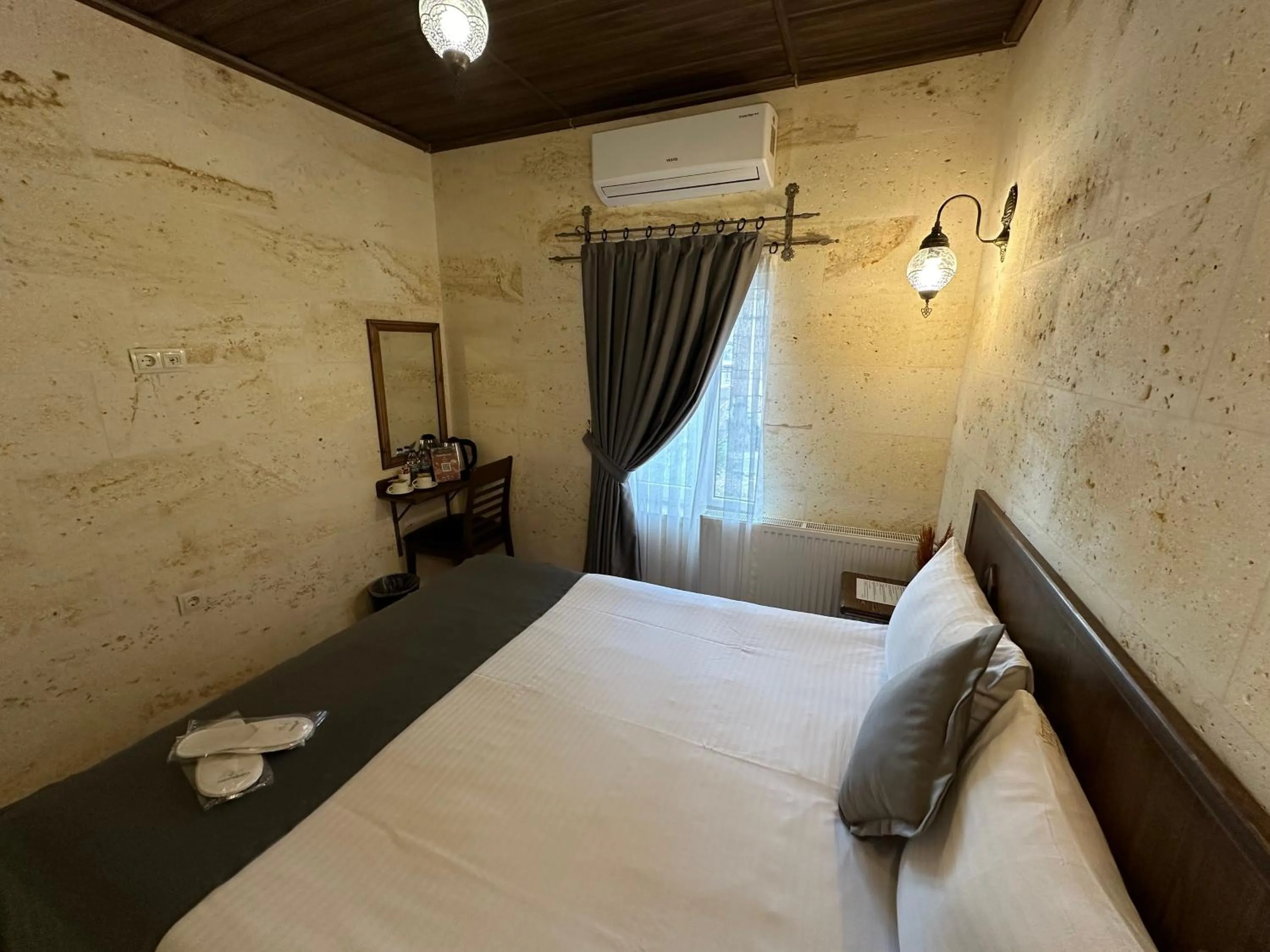 Bed in Virtus Cappadocia Hotel Göreme