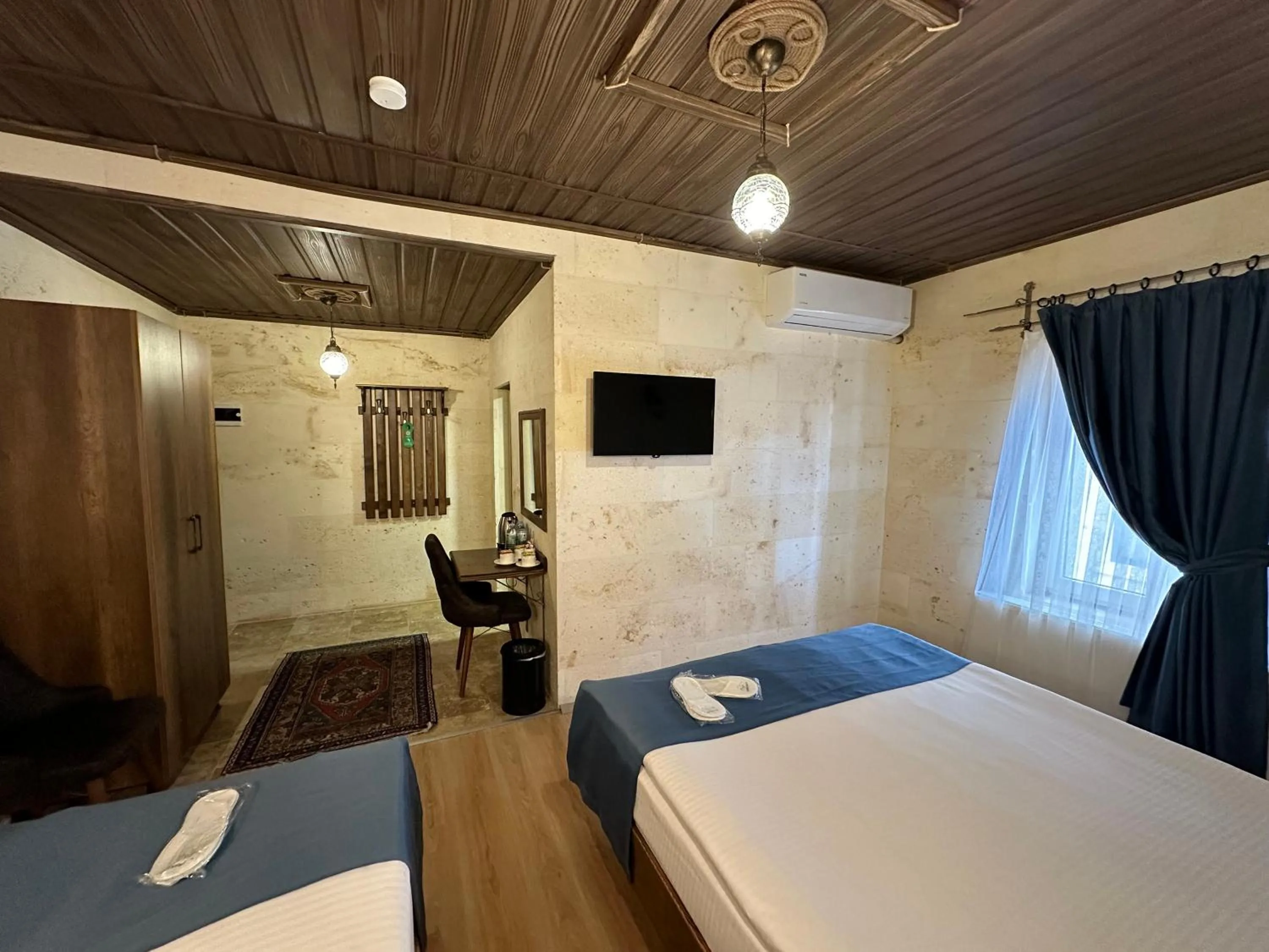 Bed in Virtus Cappadocia Hotel Göreme