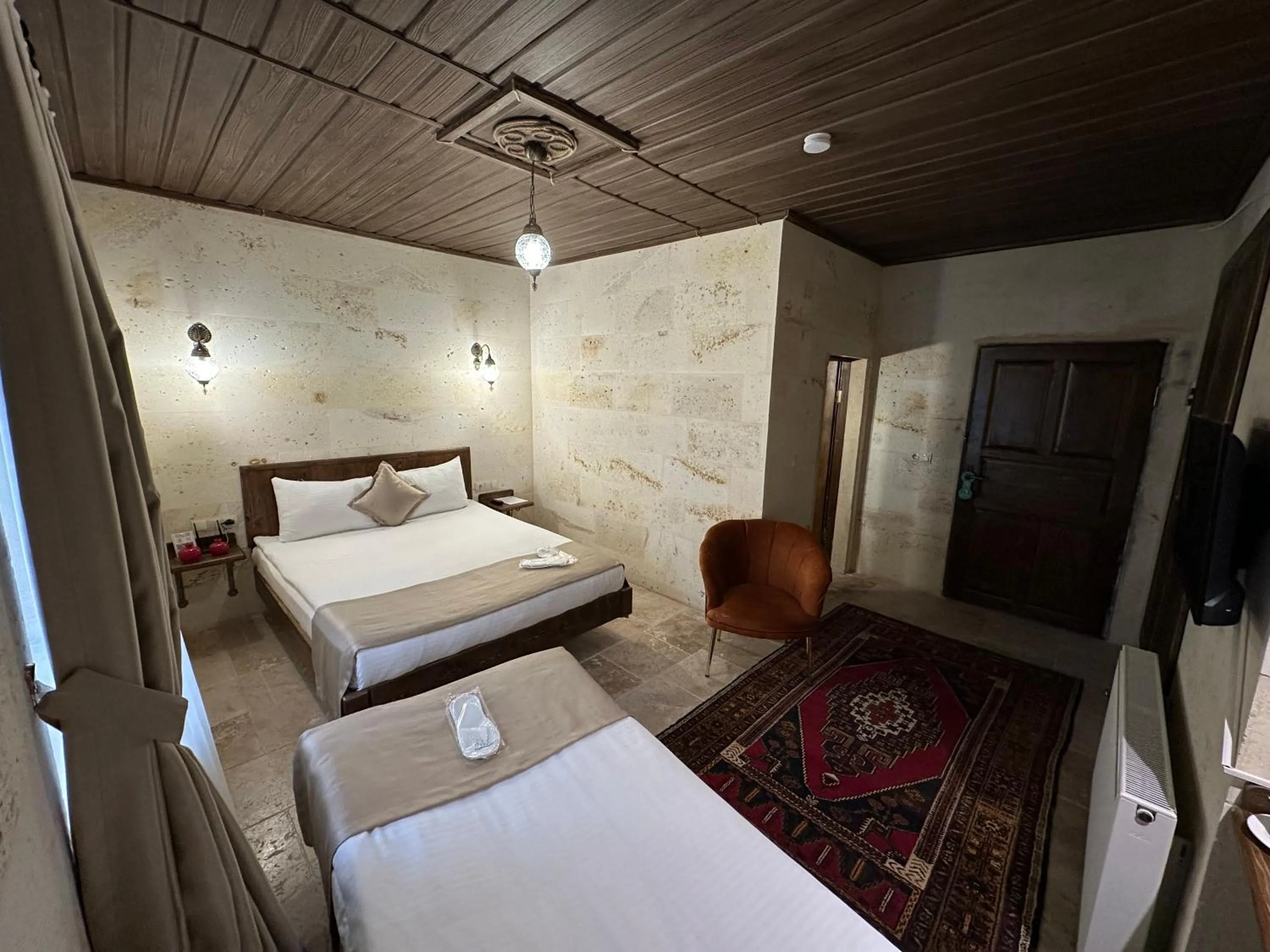 Bed in Virtus Cappadocia Hotel Göreme