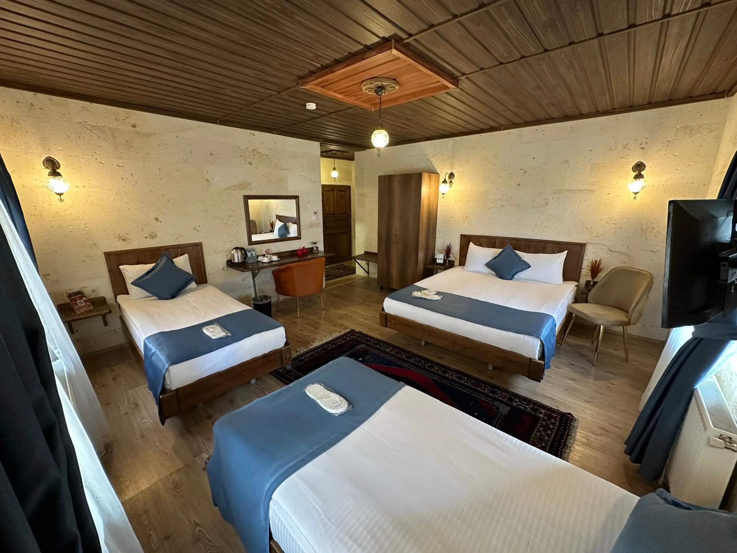 Bed in Virtus Cappadocia Hotel Göreme