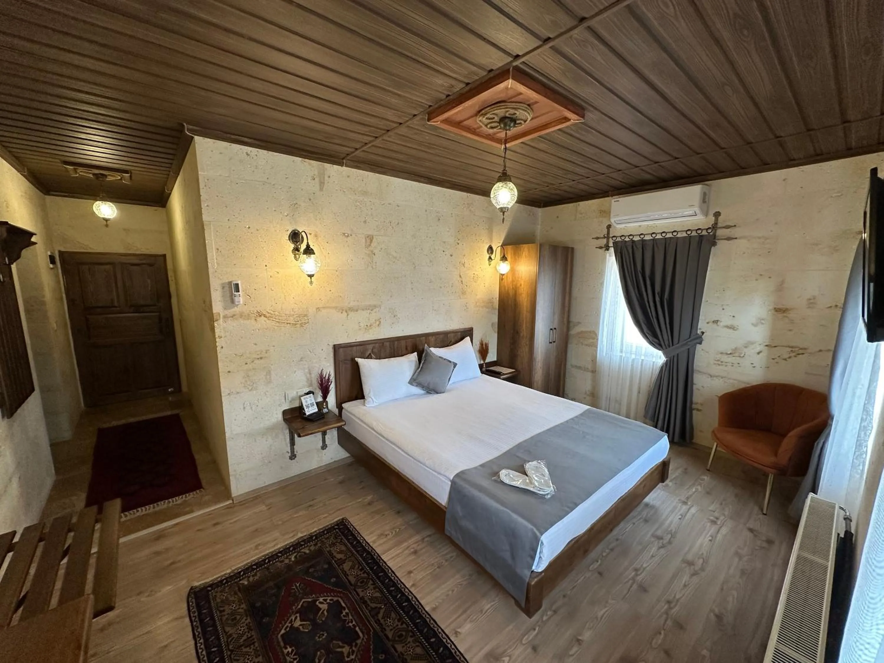 Bed in Virtus Cappadocia Hotel Göreme