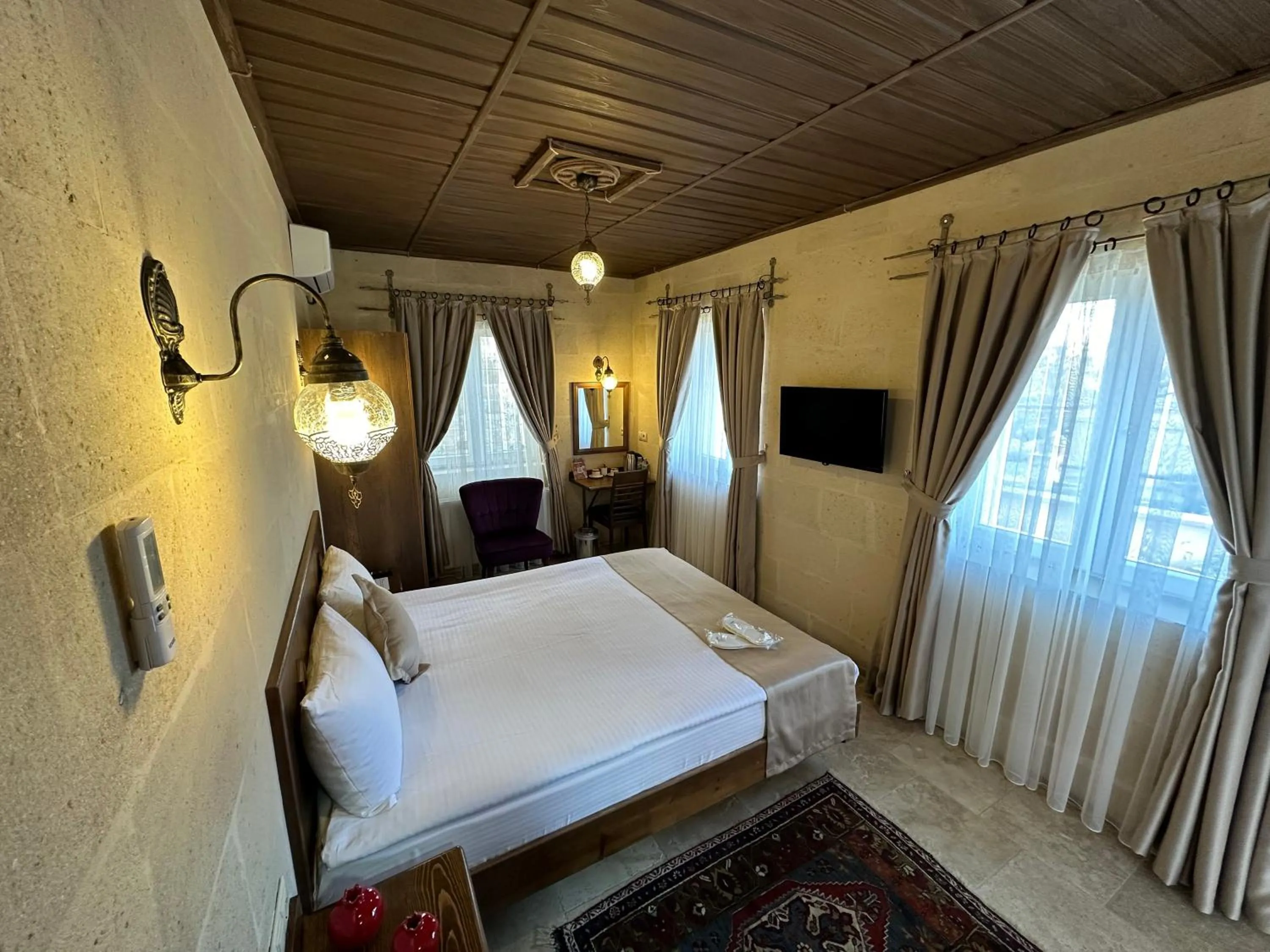 Bed in Virtus Cappadocia Hotel Göreme