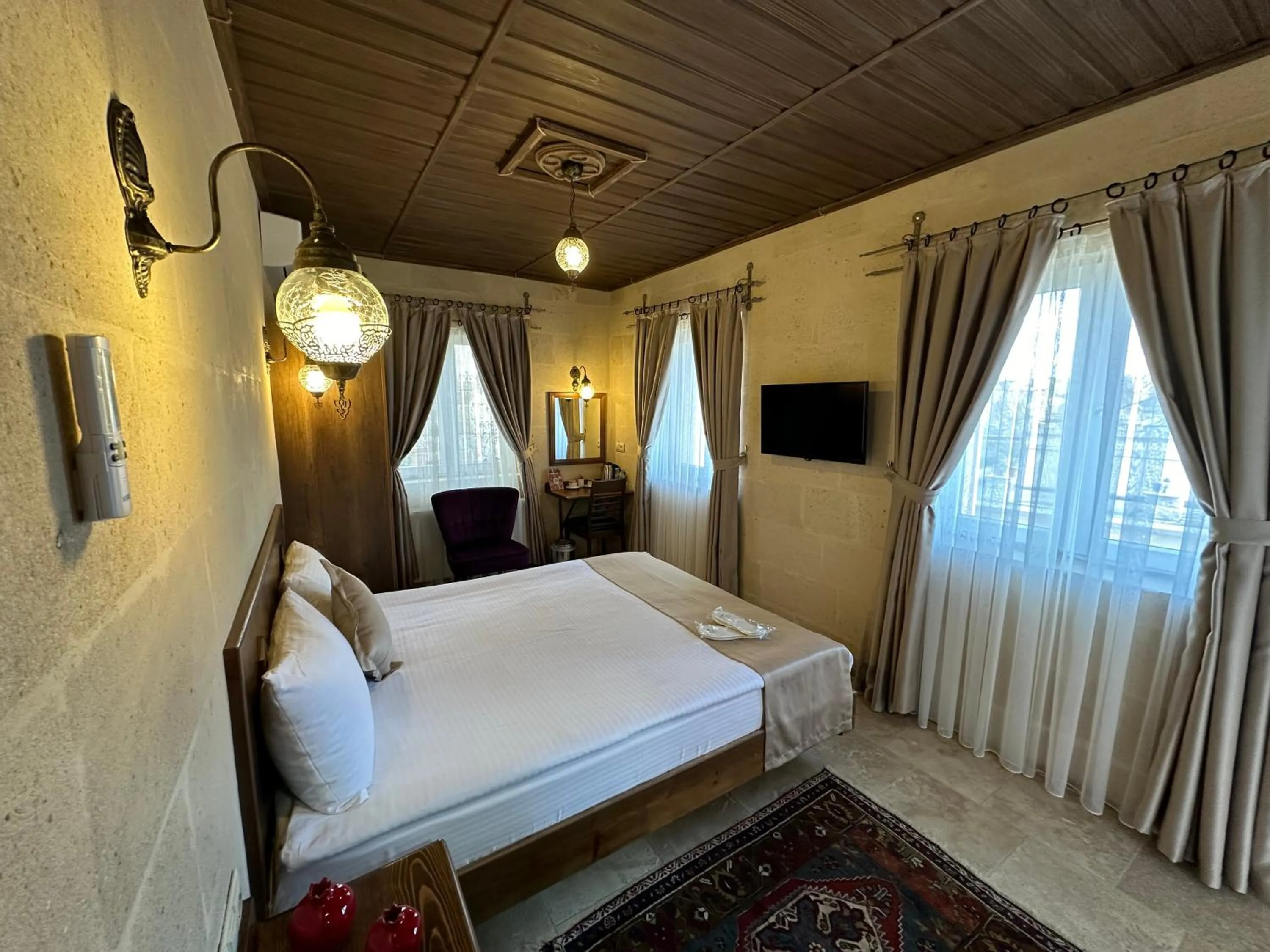 Bed in Virtus Cappadocia Hotel Göreme