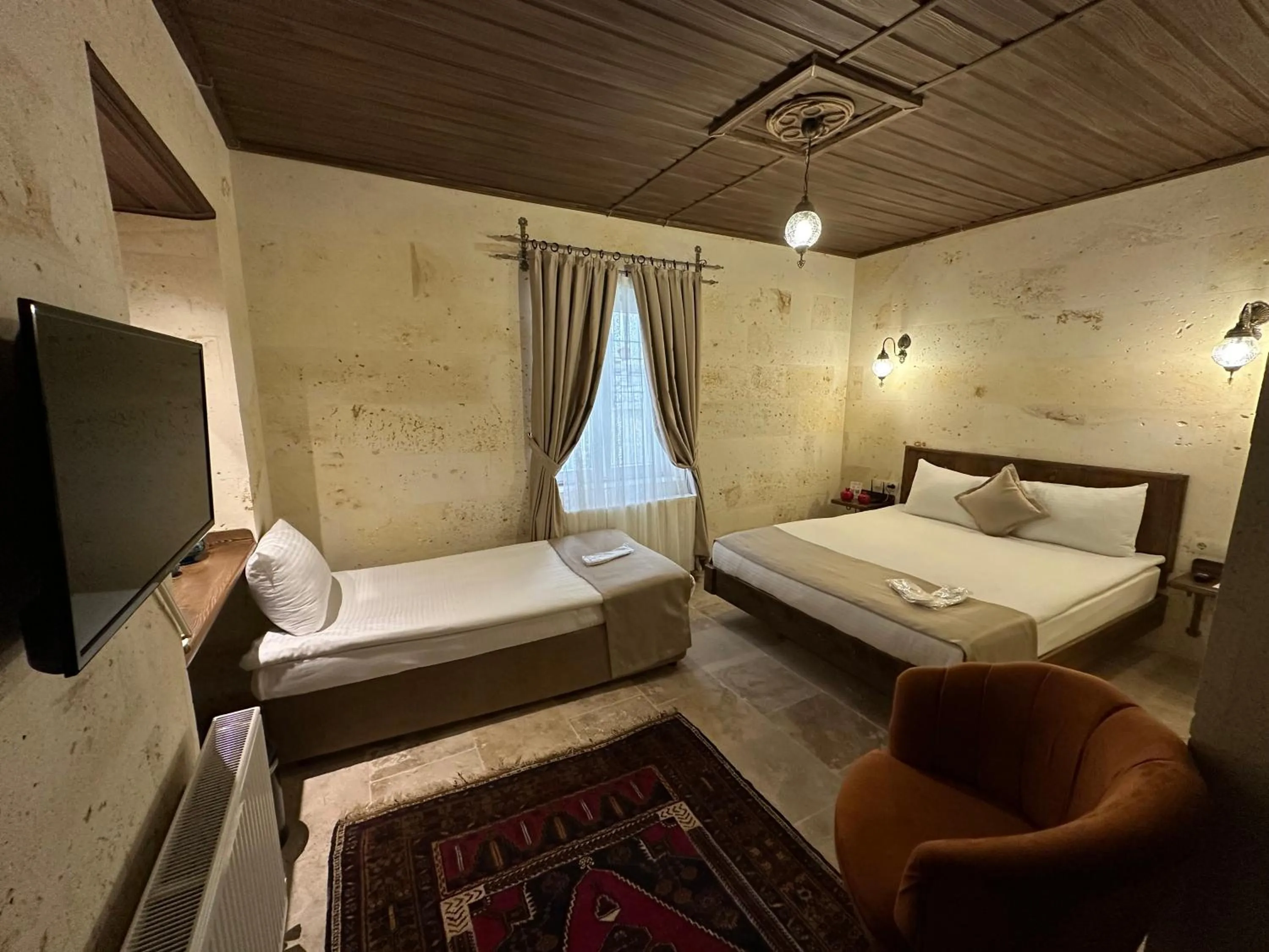 Bed in Virtus Cappadocia Hotel Göreme