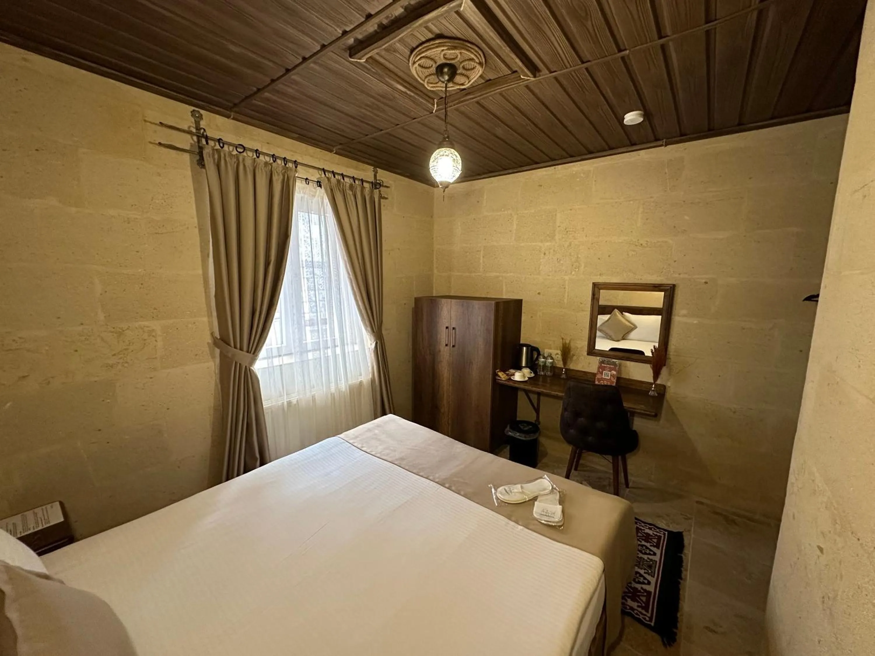 Bed in Virtus Cappadocia Hotel Göreme