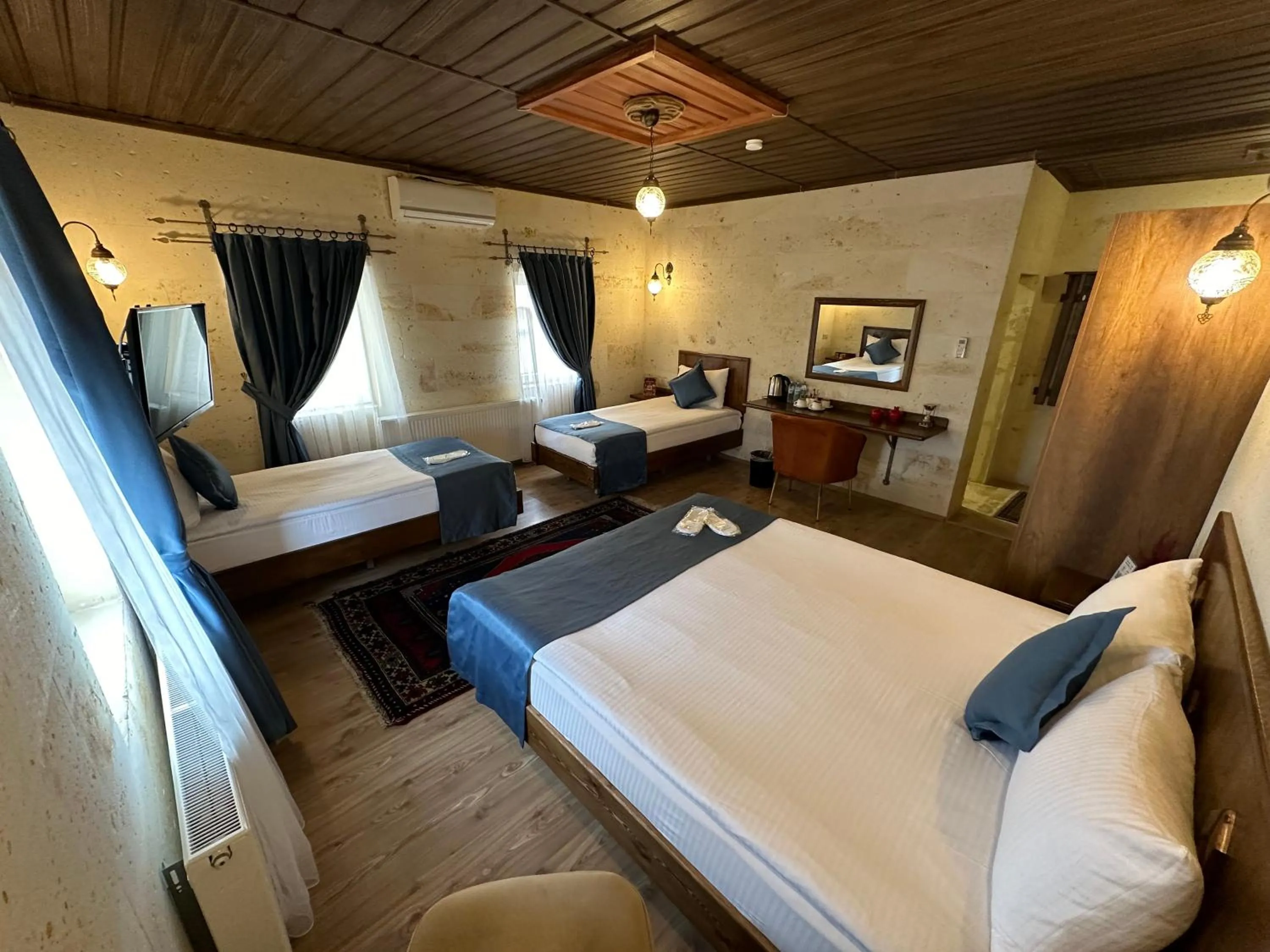 Bed in Virtus Cappadocia Hotel Göreme