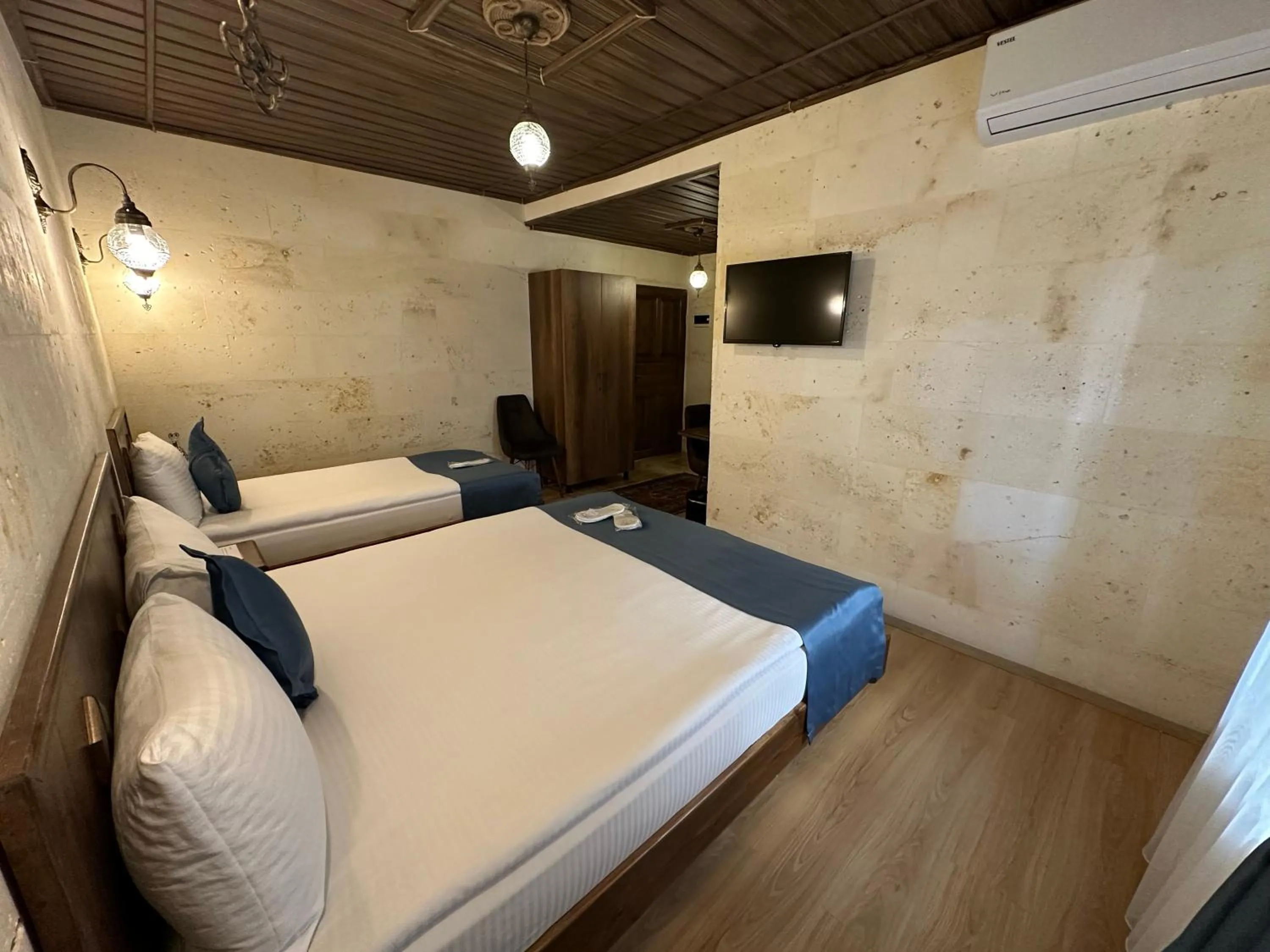 Bed in Virtus Cappadocia Hotel Göreme