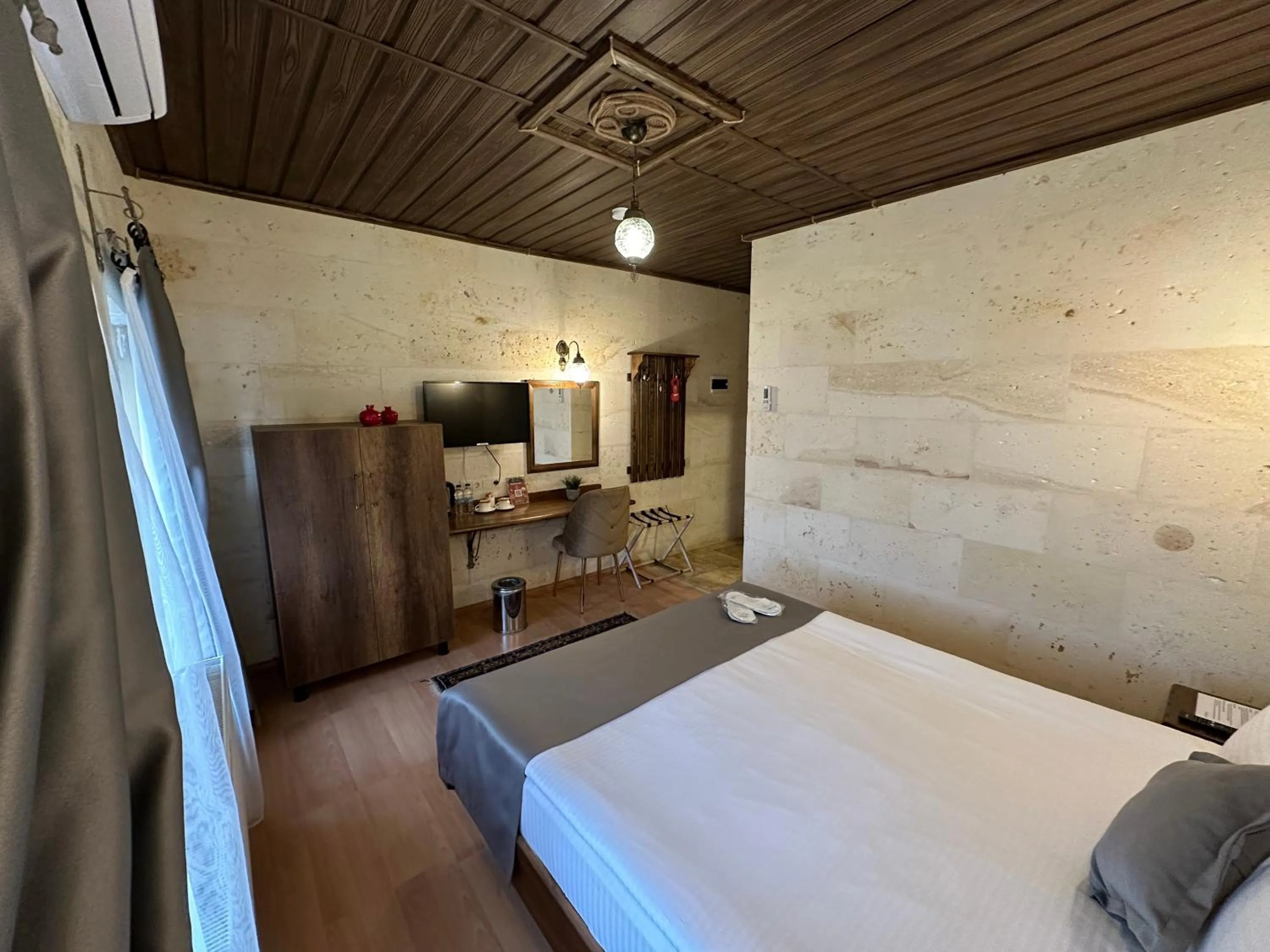 Bed in Virtus Cappadocia Hotel Göreme