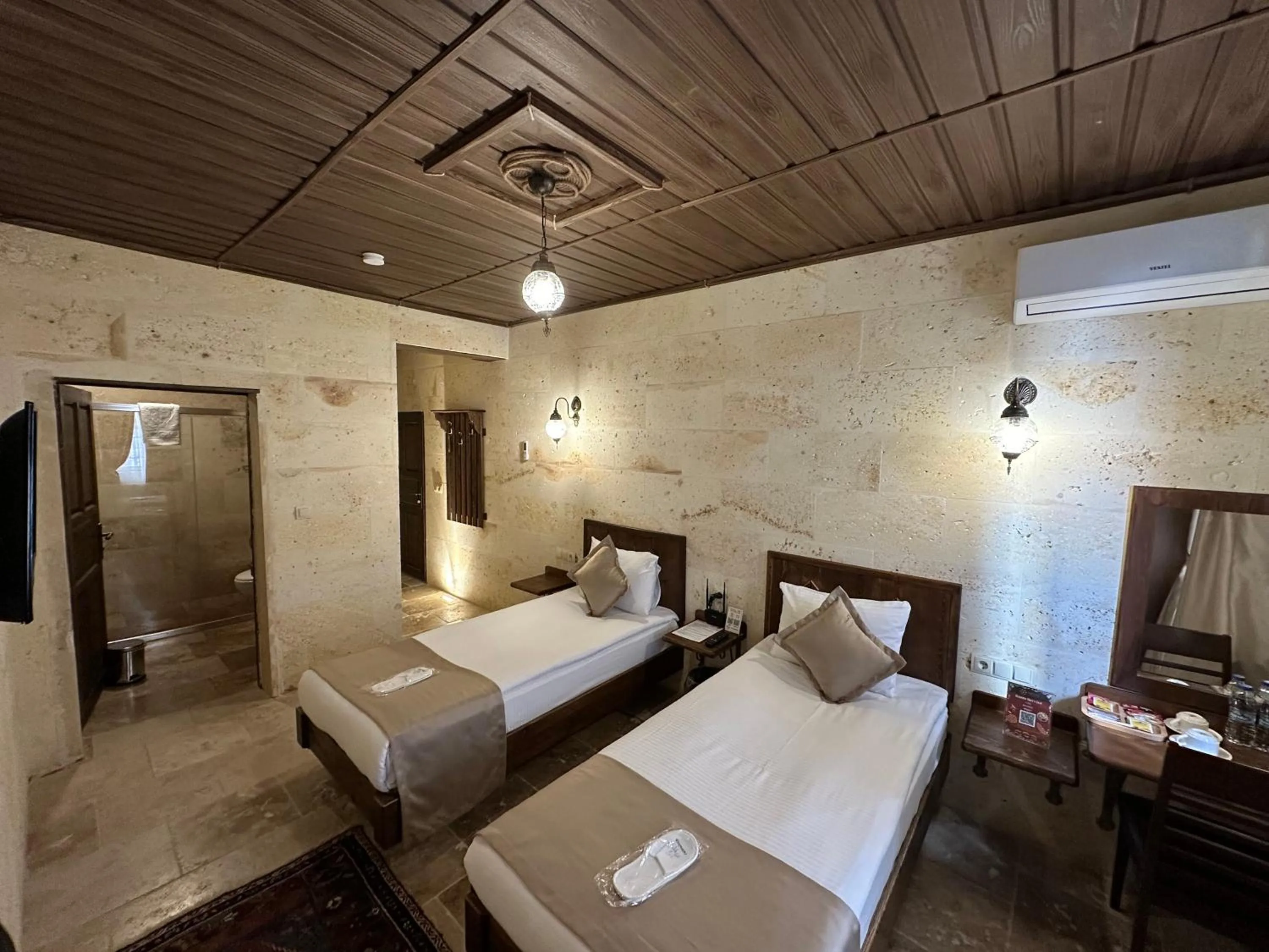 Bed in Virtus Cappadocia Hotel Göreme