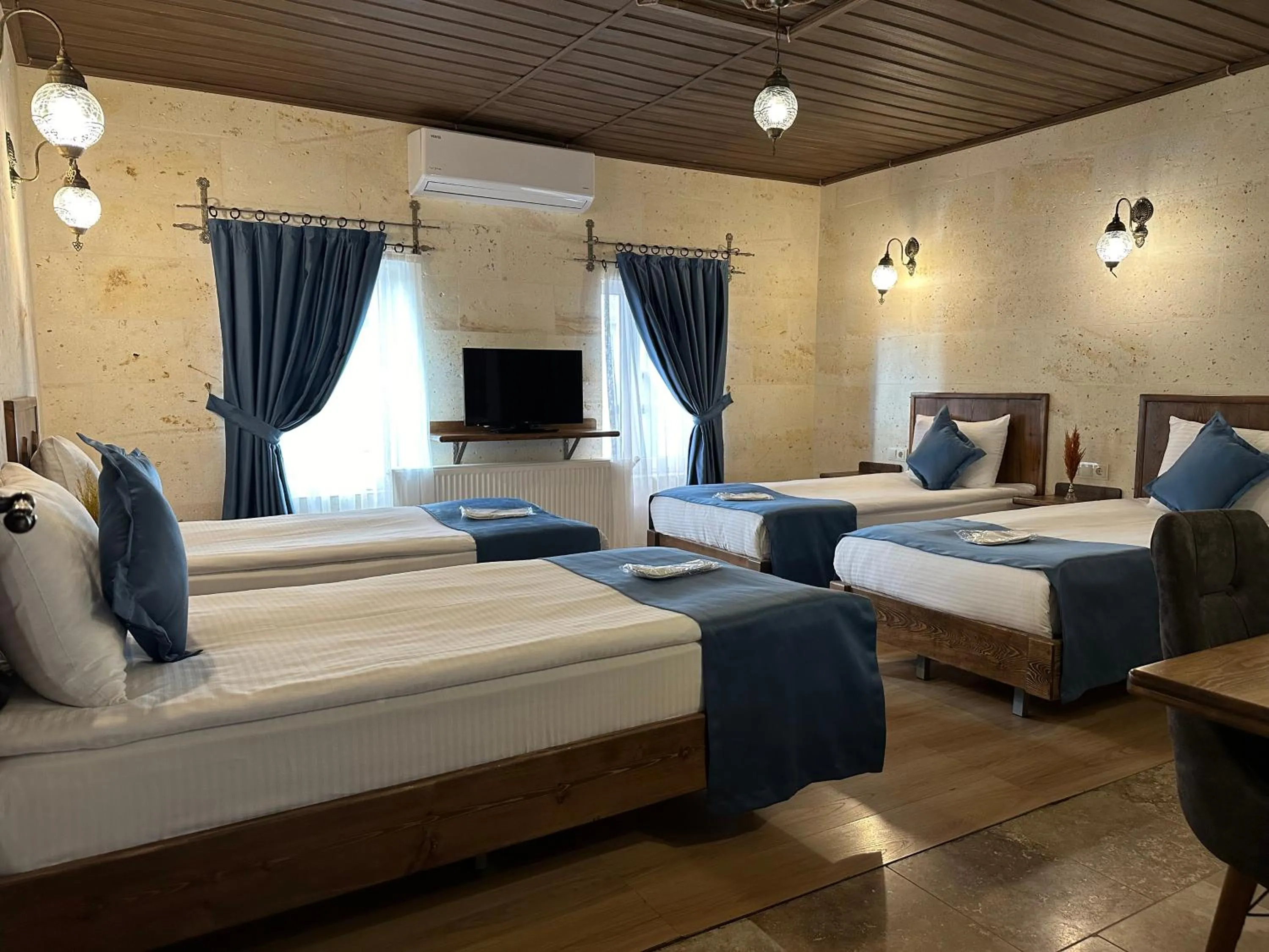 Bed in Virtus Cappadocia Hotel Göreme