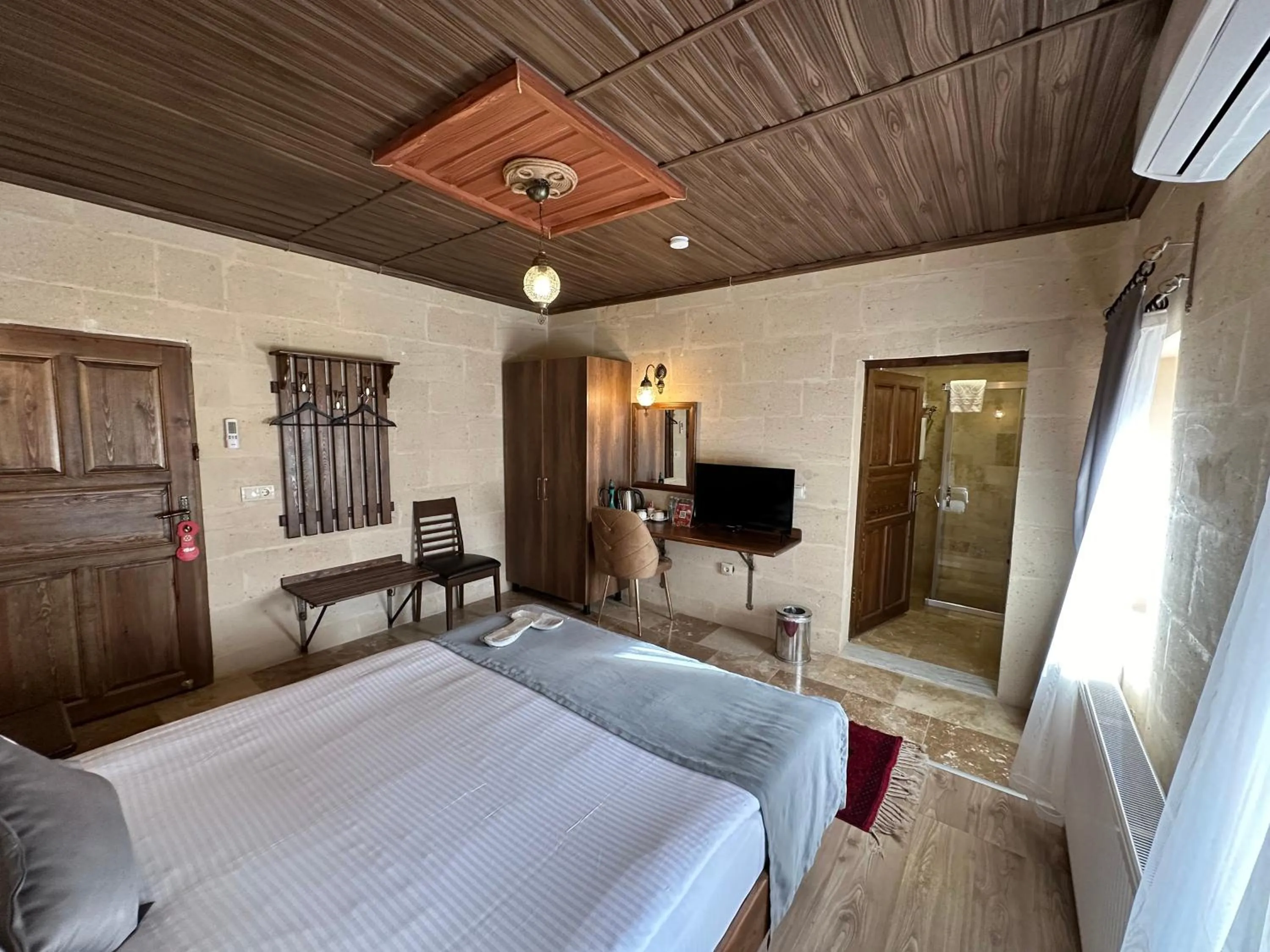 Bed in Virtus Cappadocia Hotel Göreme