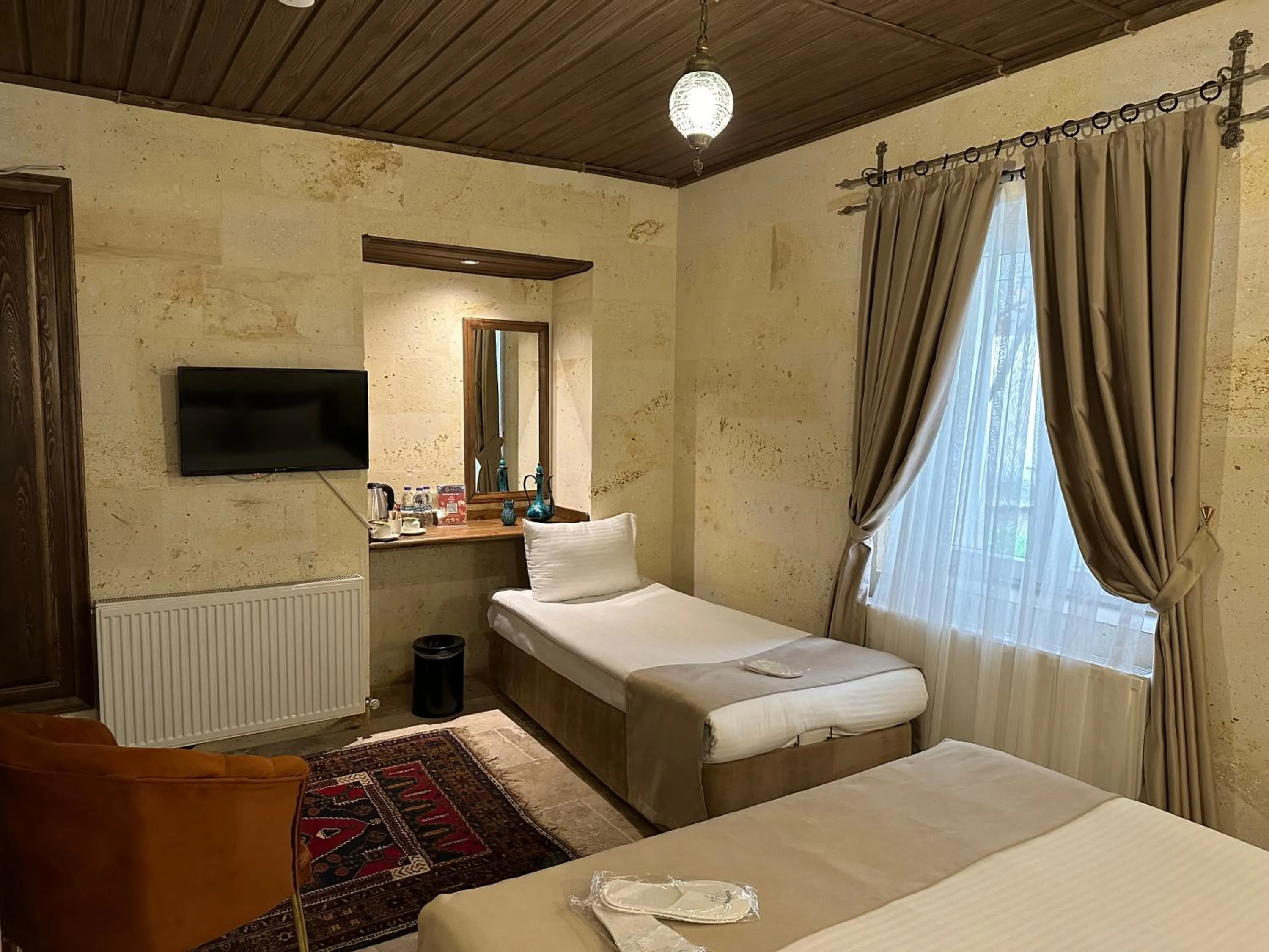 Bed in Virtus Cappadocia Hotel Göreme