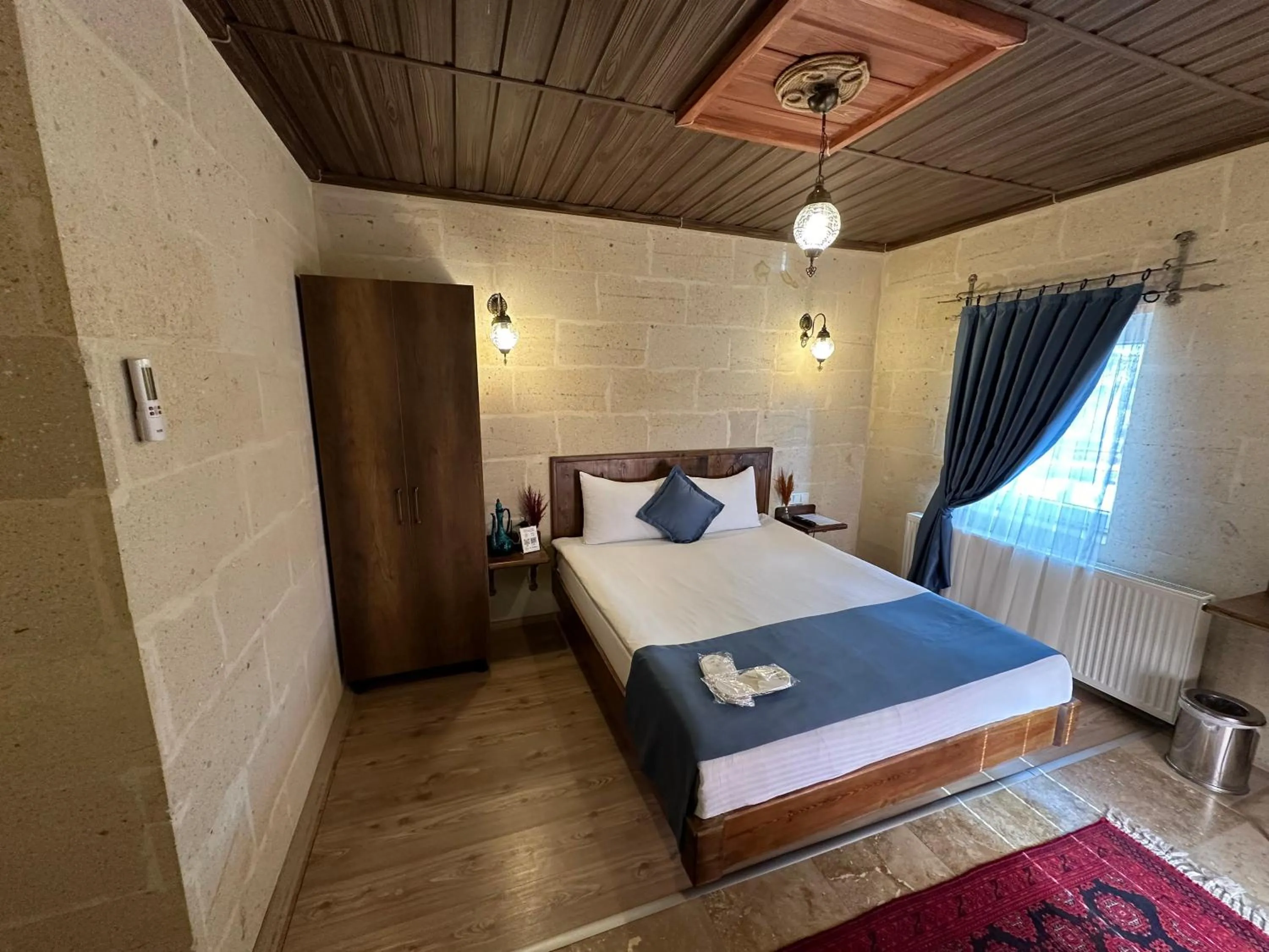 Bed in Virtus Cappadocia Hotel Göreme