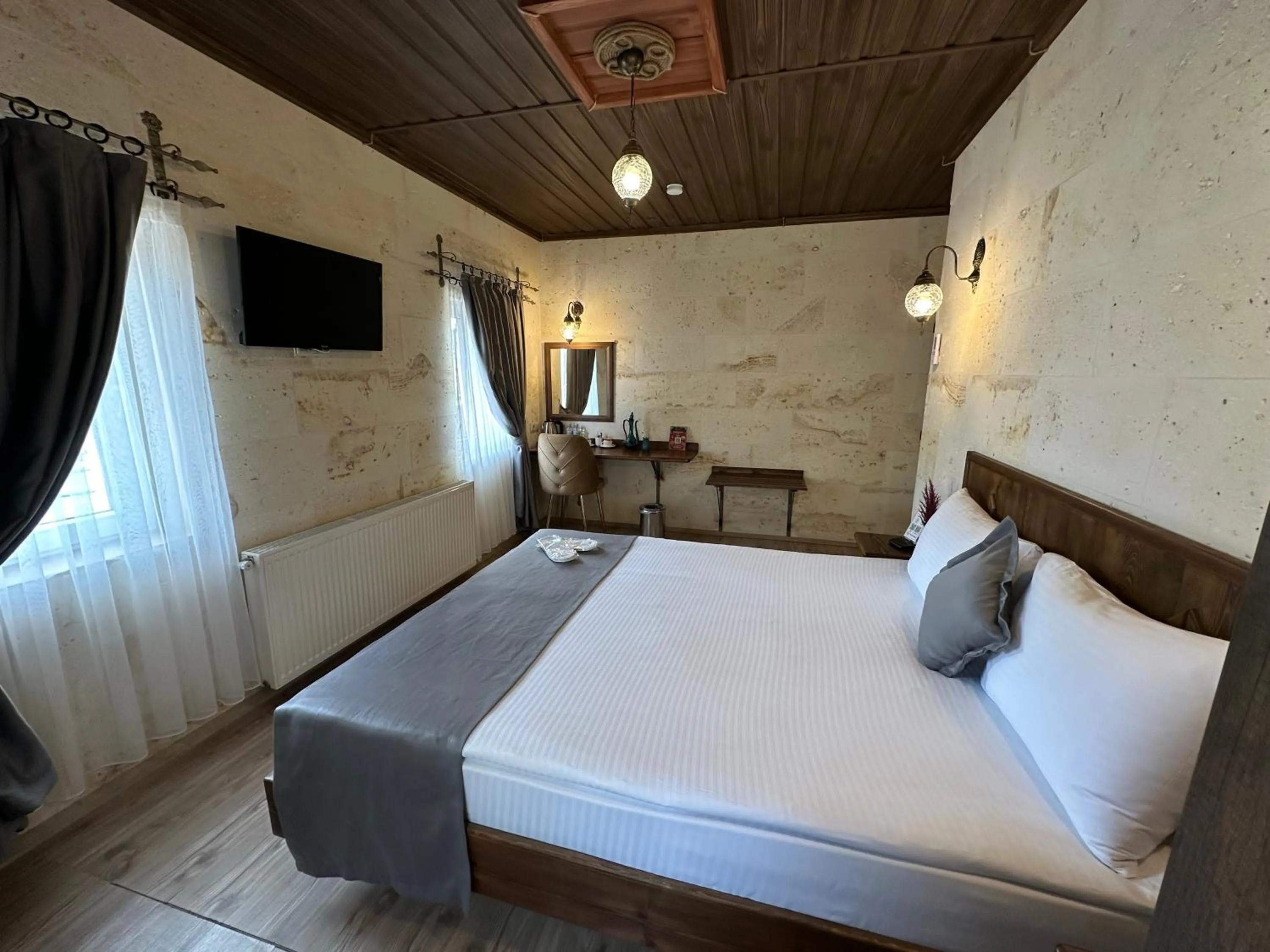 Bed in Virtus Cappadocia Hotel Göreme