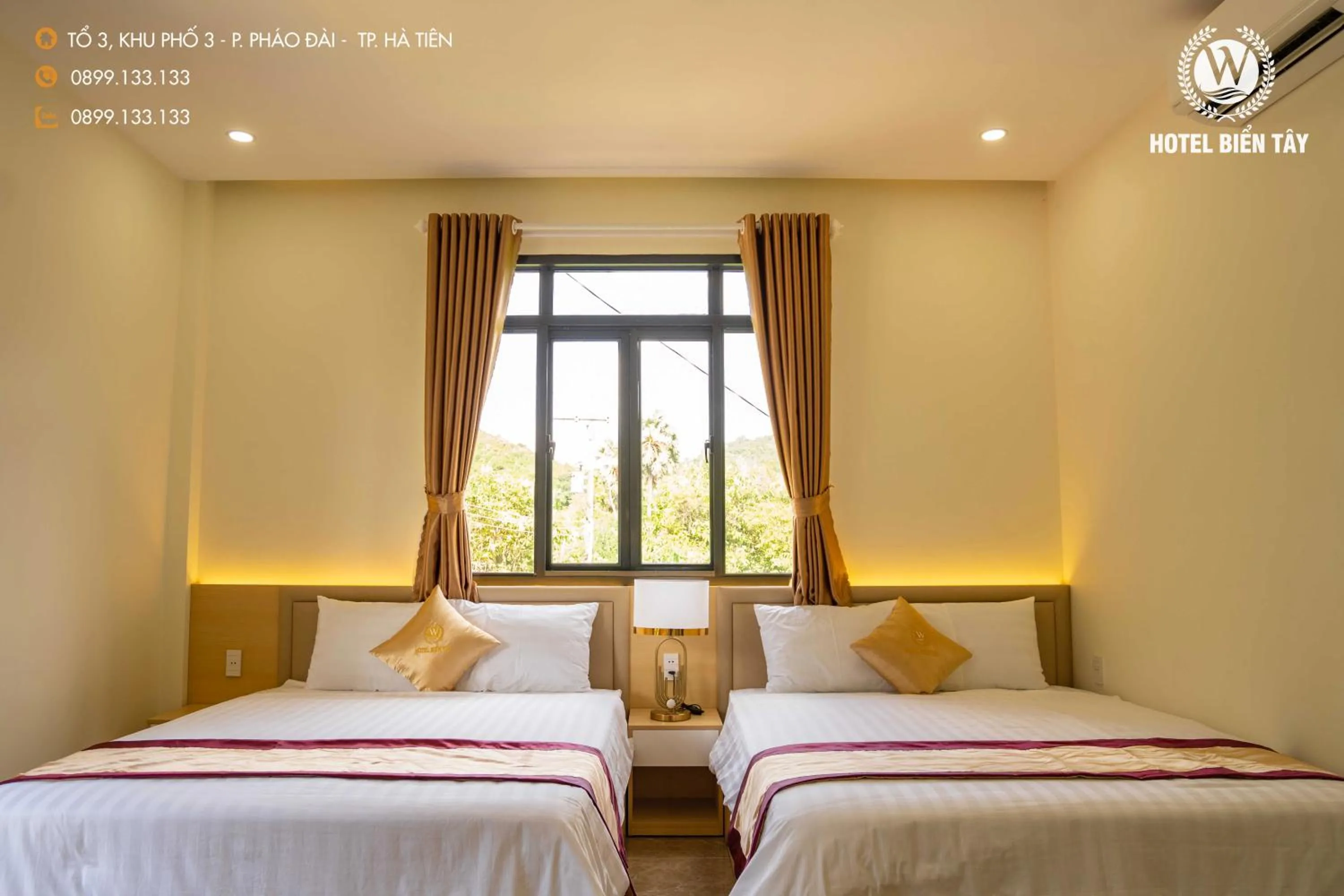 Bed in KHÁCH SẠN BIỂN TÂY