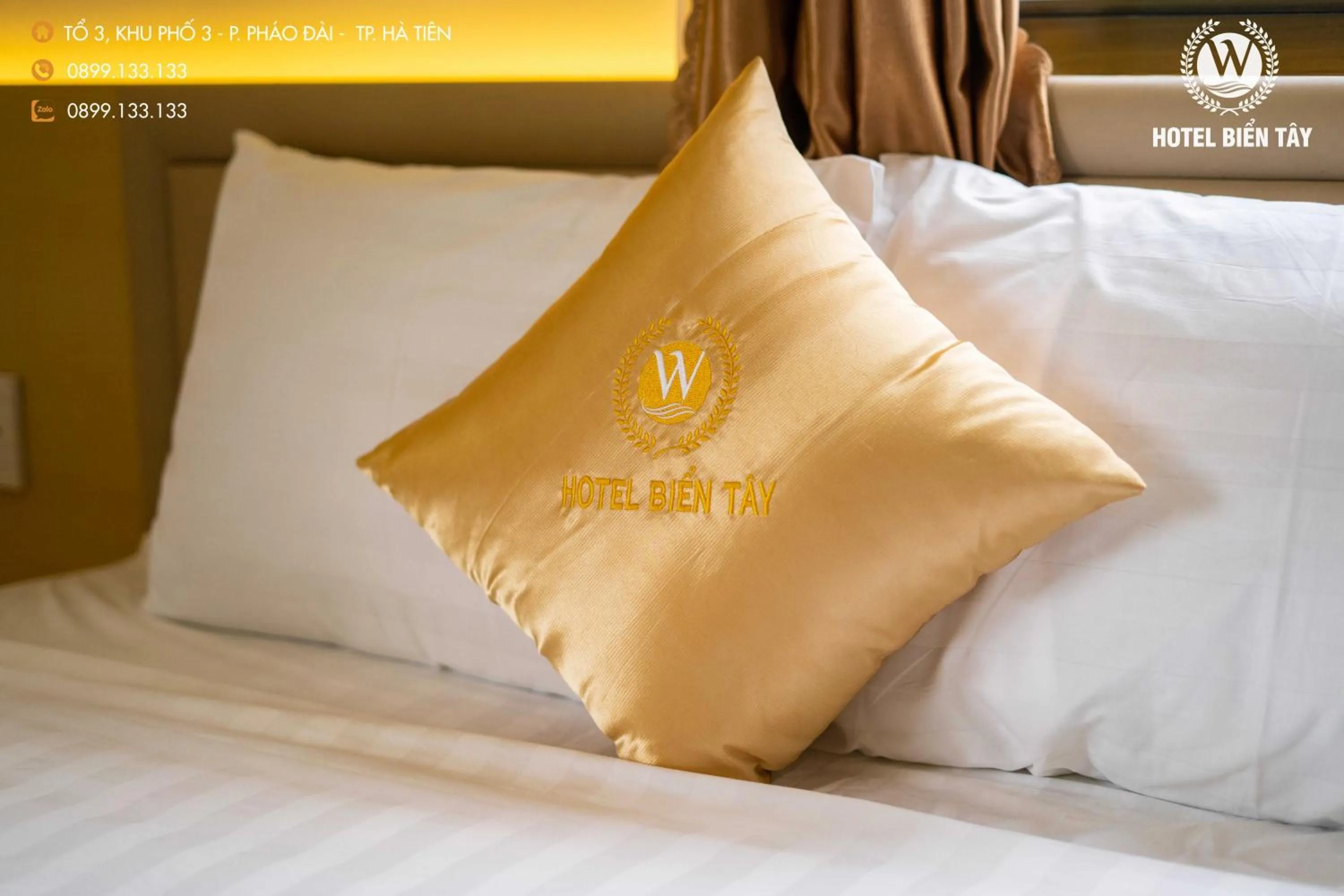 Bed in KHÁCH SẠN BIỂN TÂY