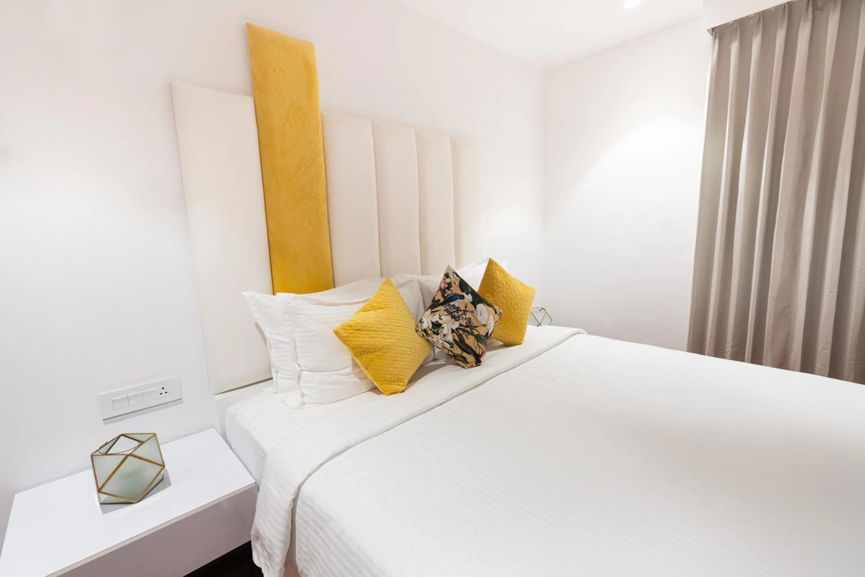 Bed in DARZA LUXURY RESORTs