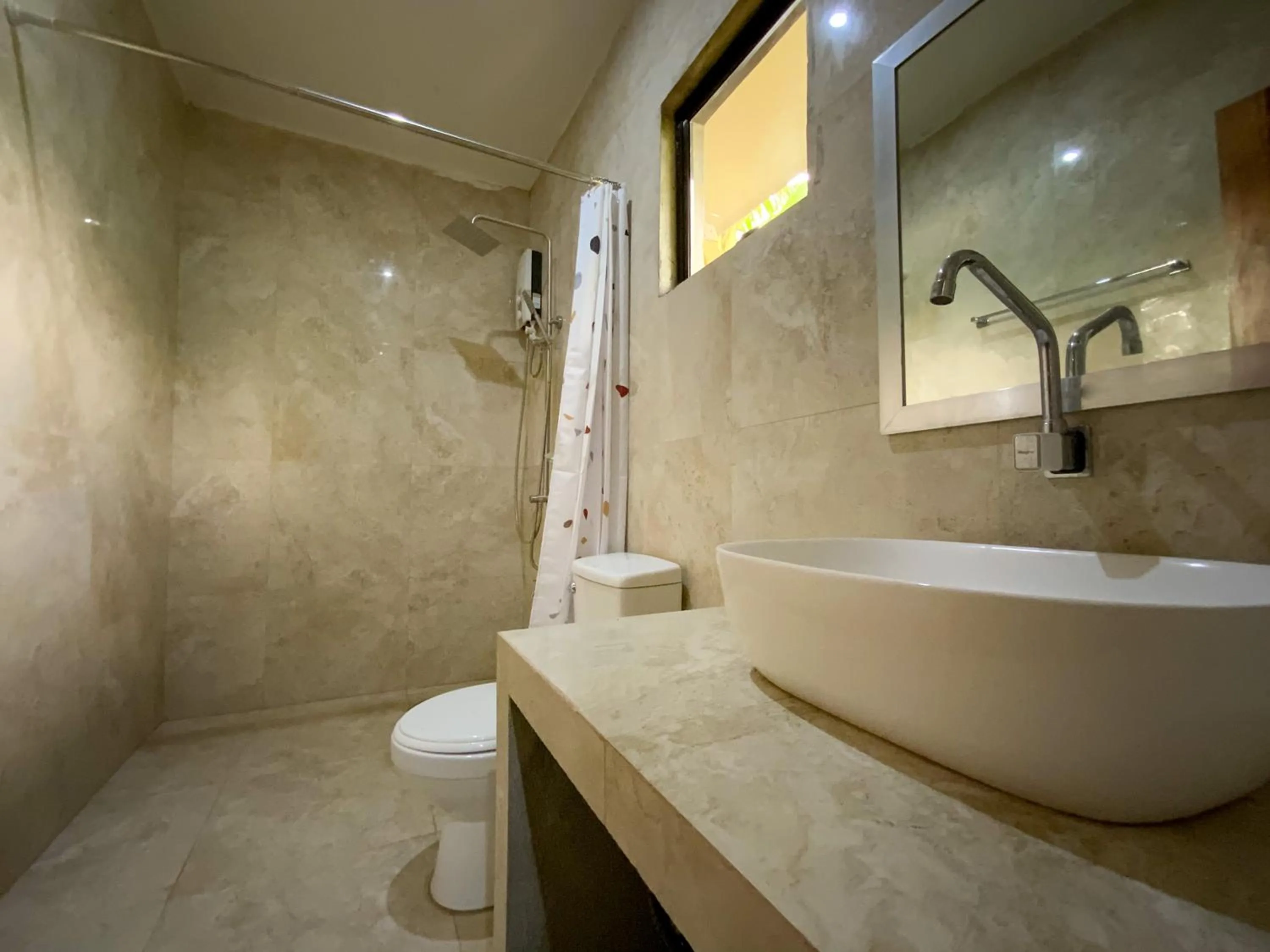 Shower in Infinity Diving Resort and Residences