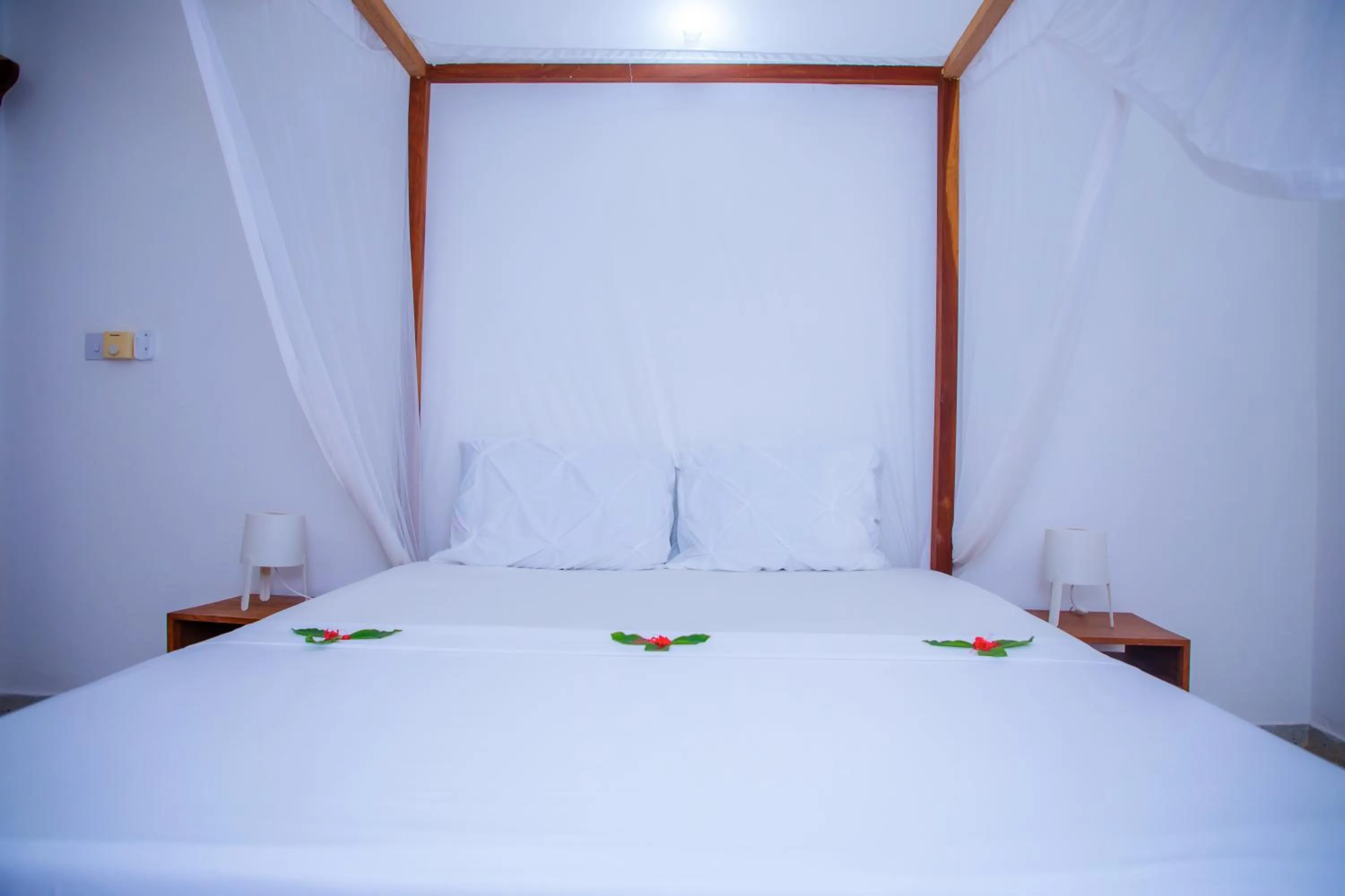 Bed in Art Hotel Zanzibar