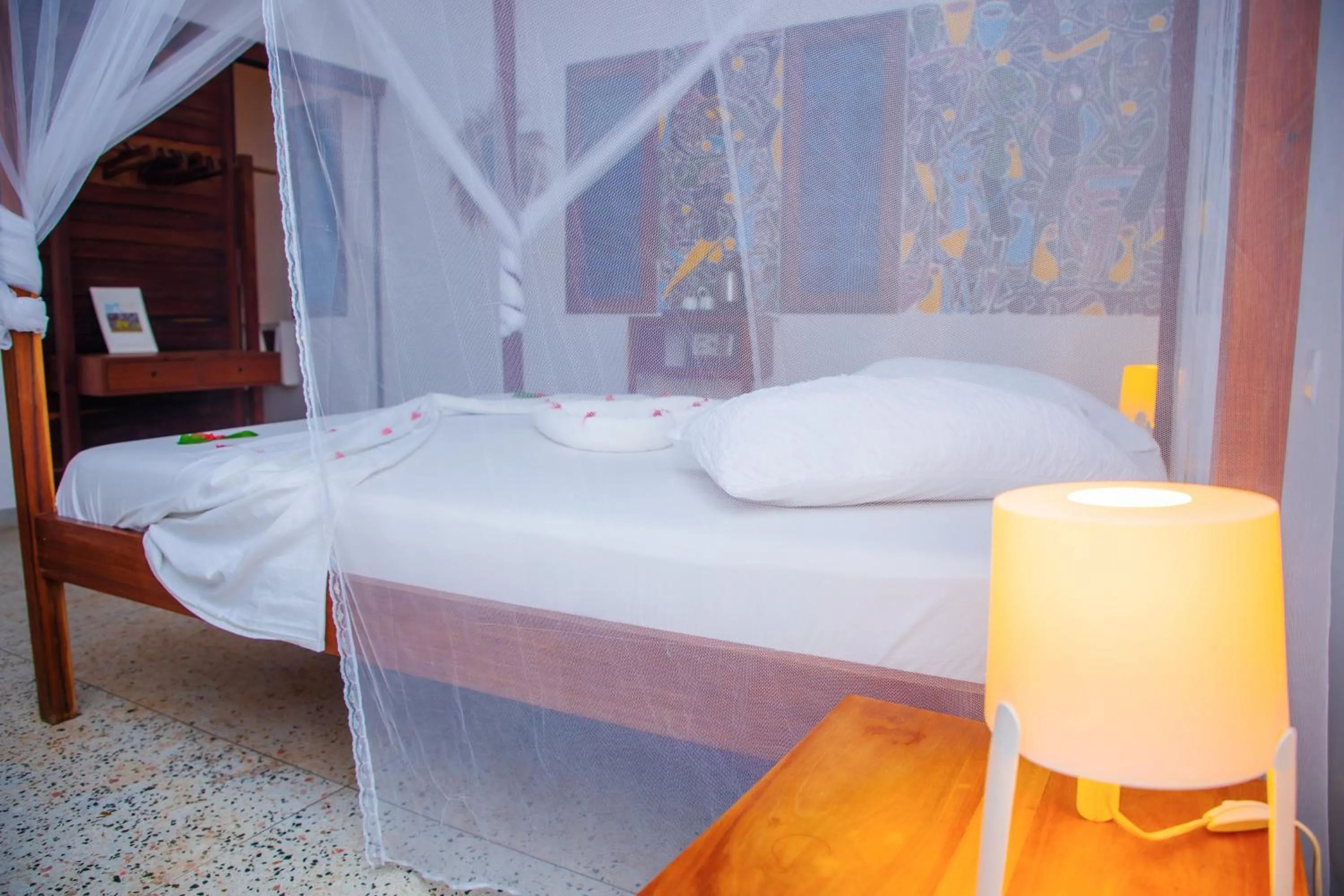 Bed in Art Hotel Zanzibar