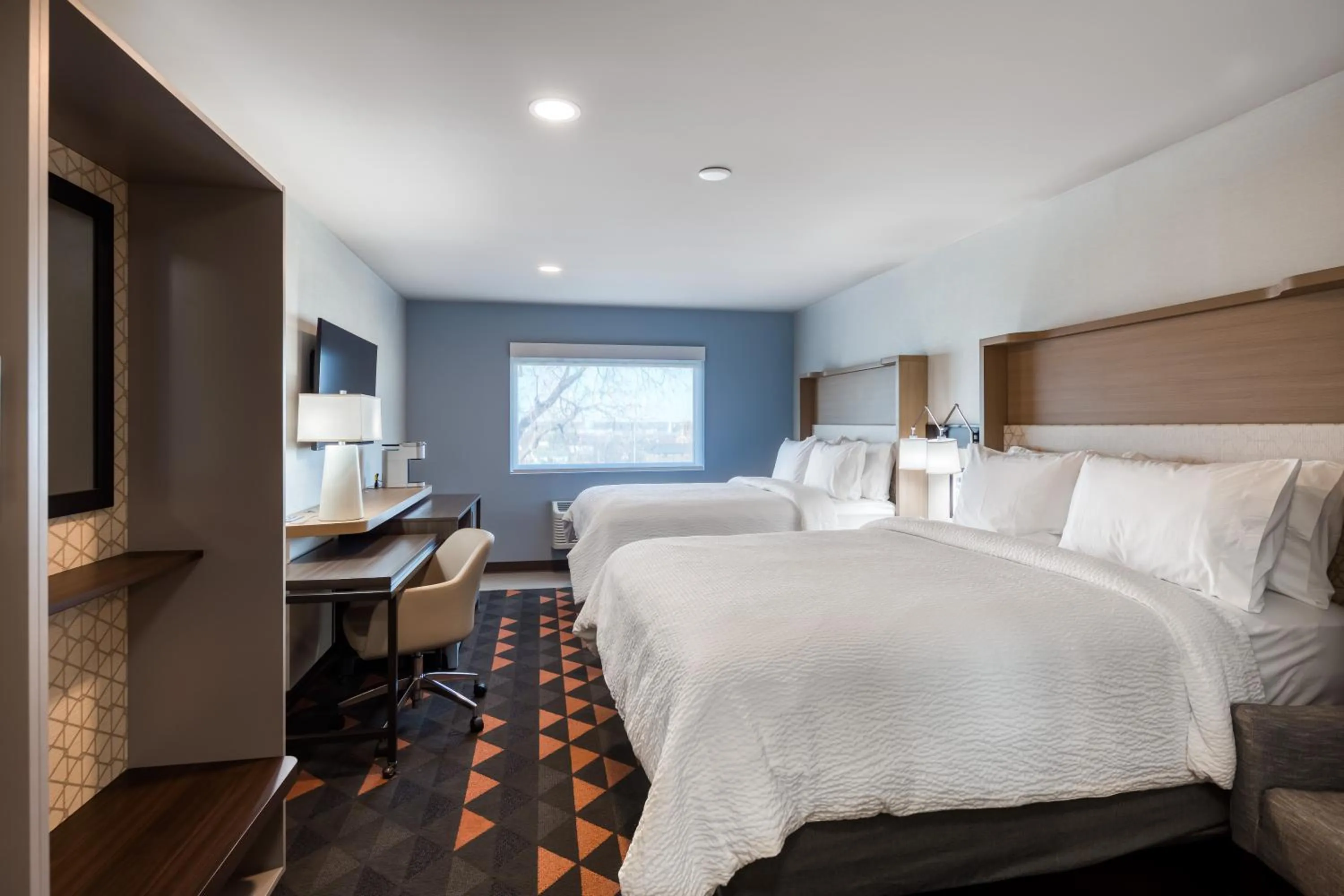 Bed in Holiday Inn Kansas City - Downtown by IHG