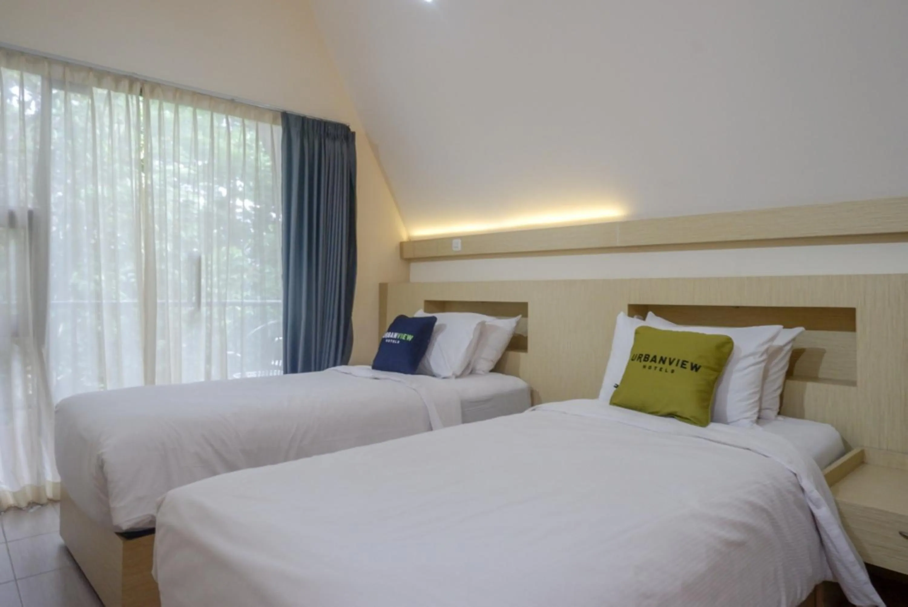 Bed in Urbanview Resort Kampoeng Media Yogyakarta by RedDoorz