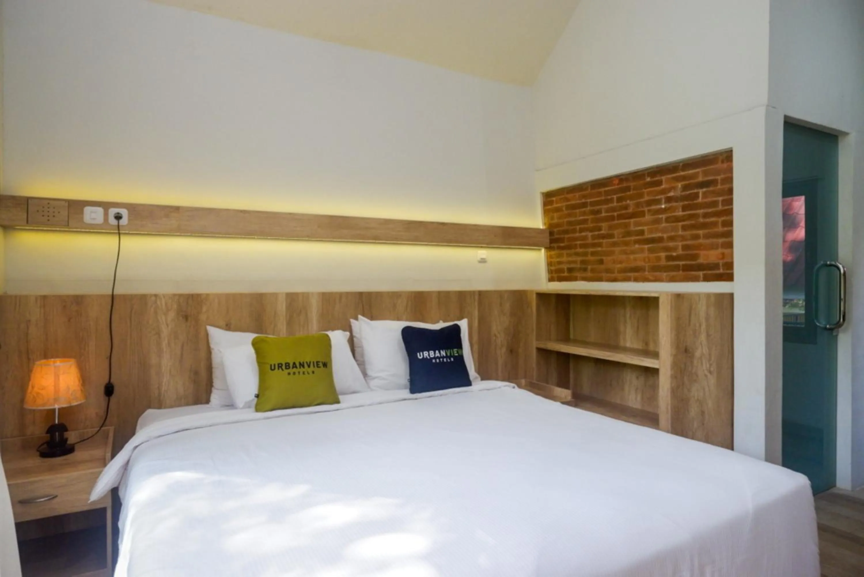 Bed in Urbanview Resort Kampoeng Media Yogyakarta by RedDoorz