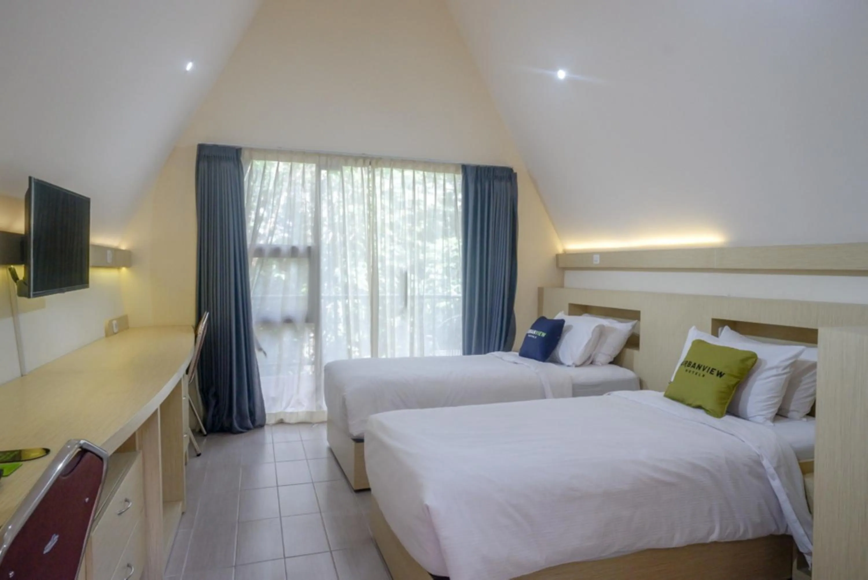 Bed in Urbanview Resort Kampoeng Media Yogyakarta by RedDoorz