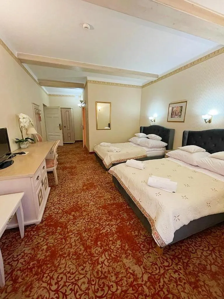 Photo of the whole room in Great Polonia Kraków Old Town