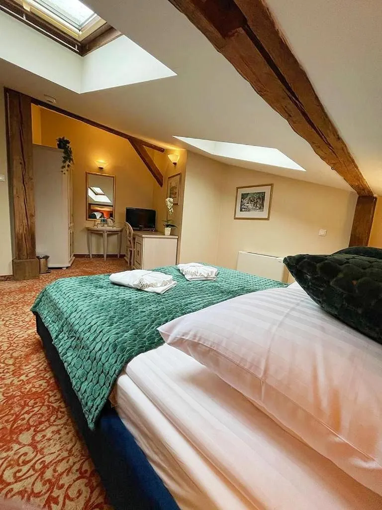 Photo of the whole room in Great Polonia Kraków Old Town