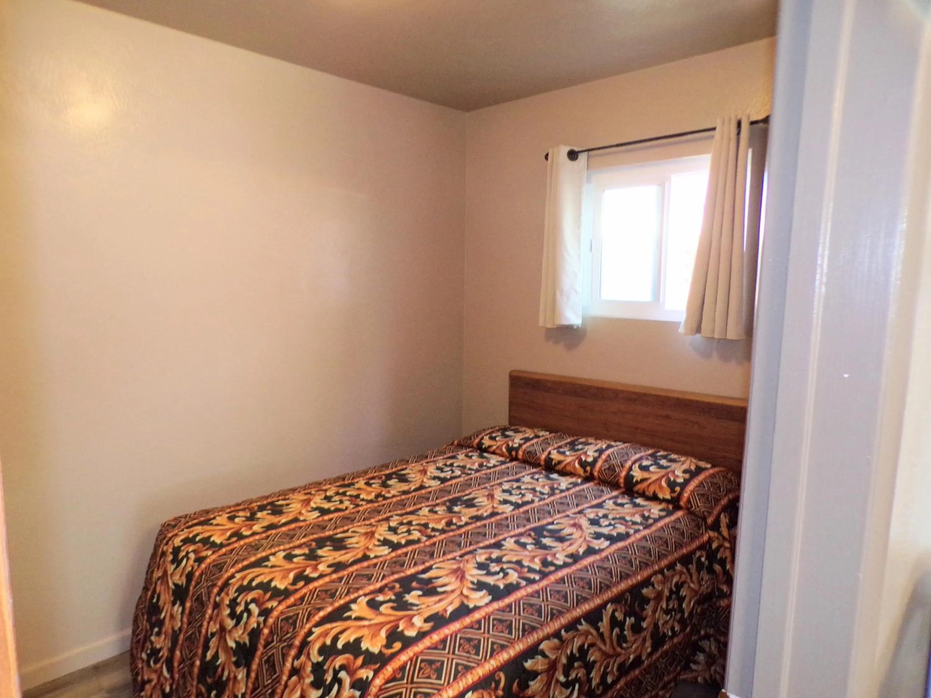 Bed in Cypress Tree Motel