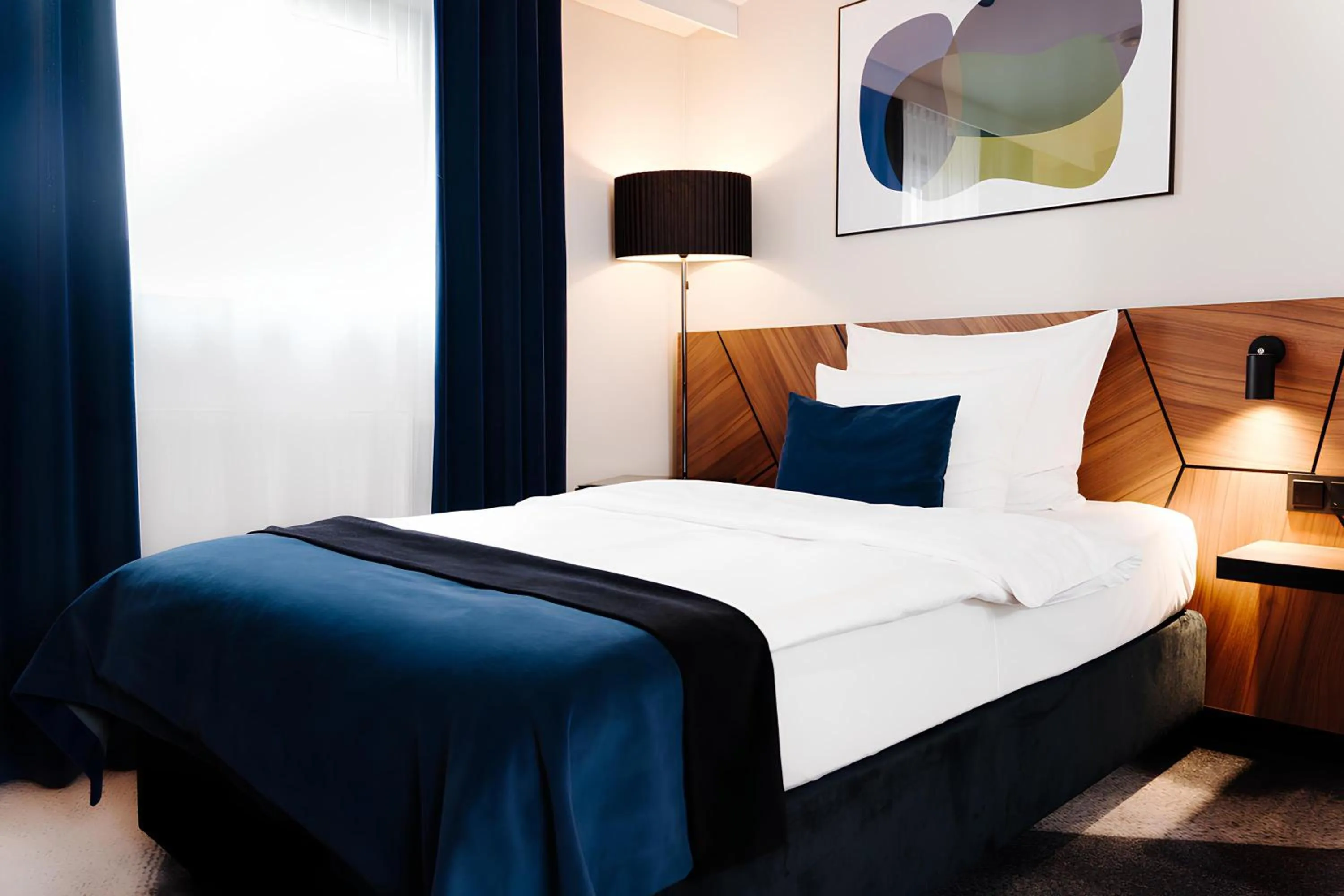 Bed in Ascot Premium Hotel