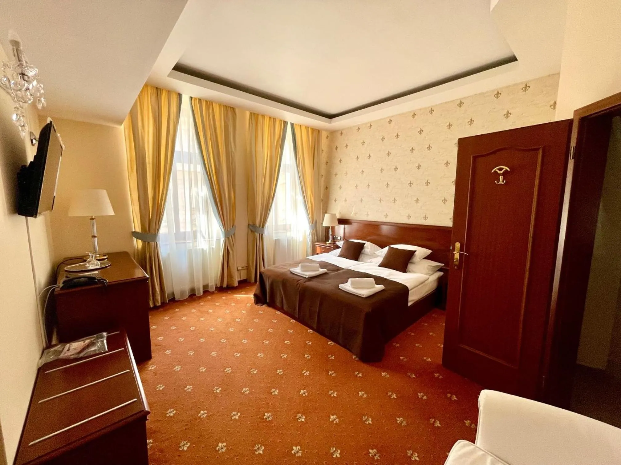 Bed in FLEUR DE LIS HOTEL