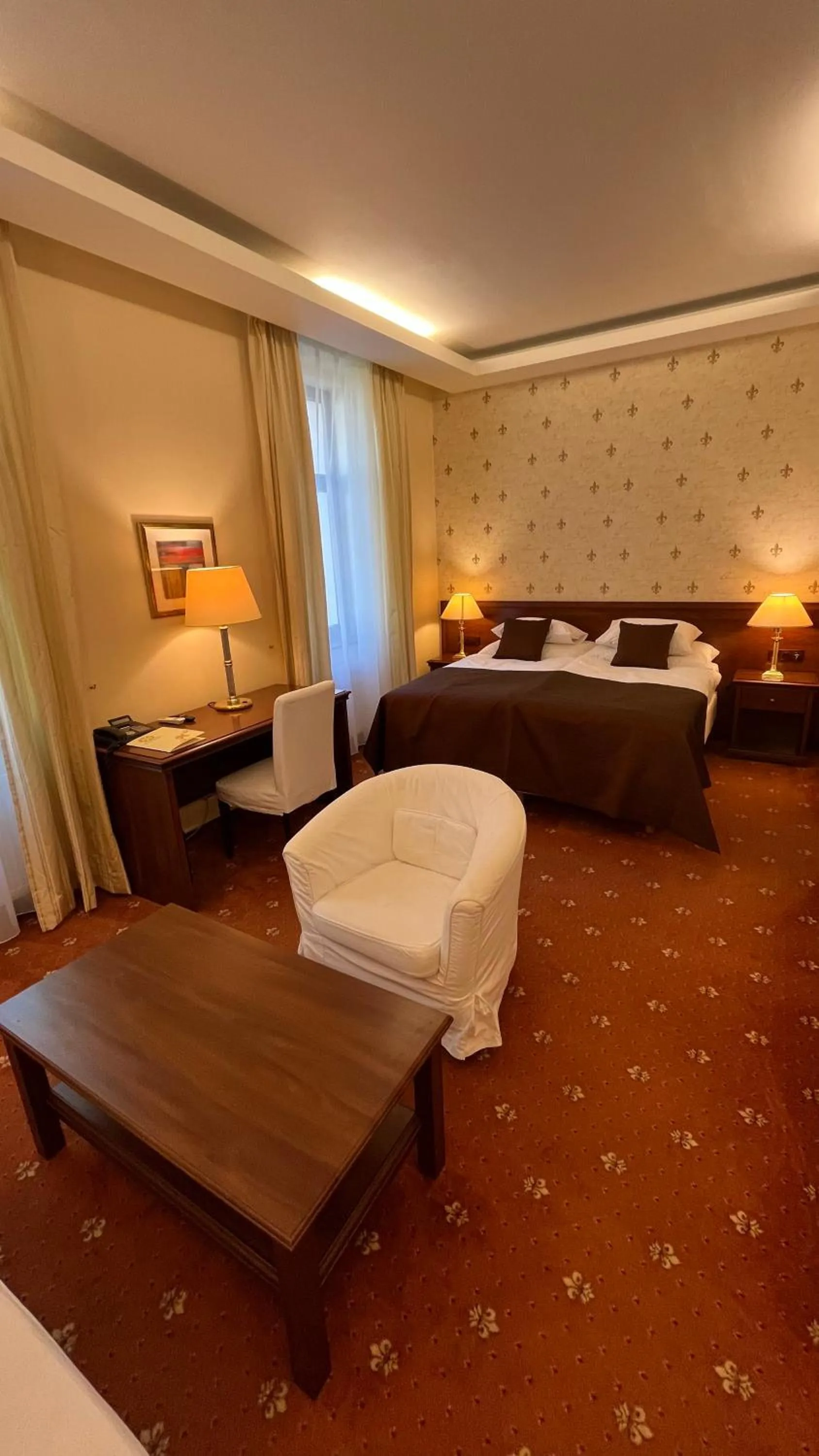 Bed in FLEUR DE LIS HOTEL