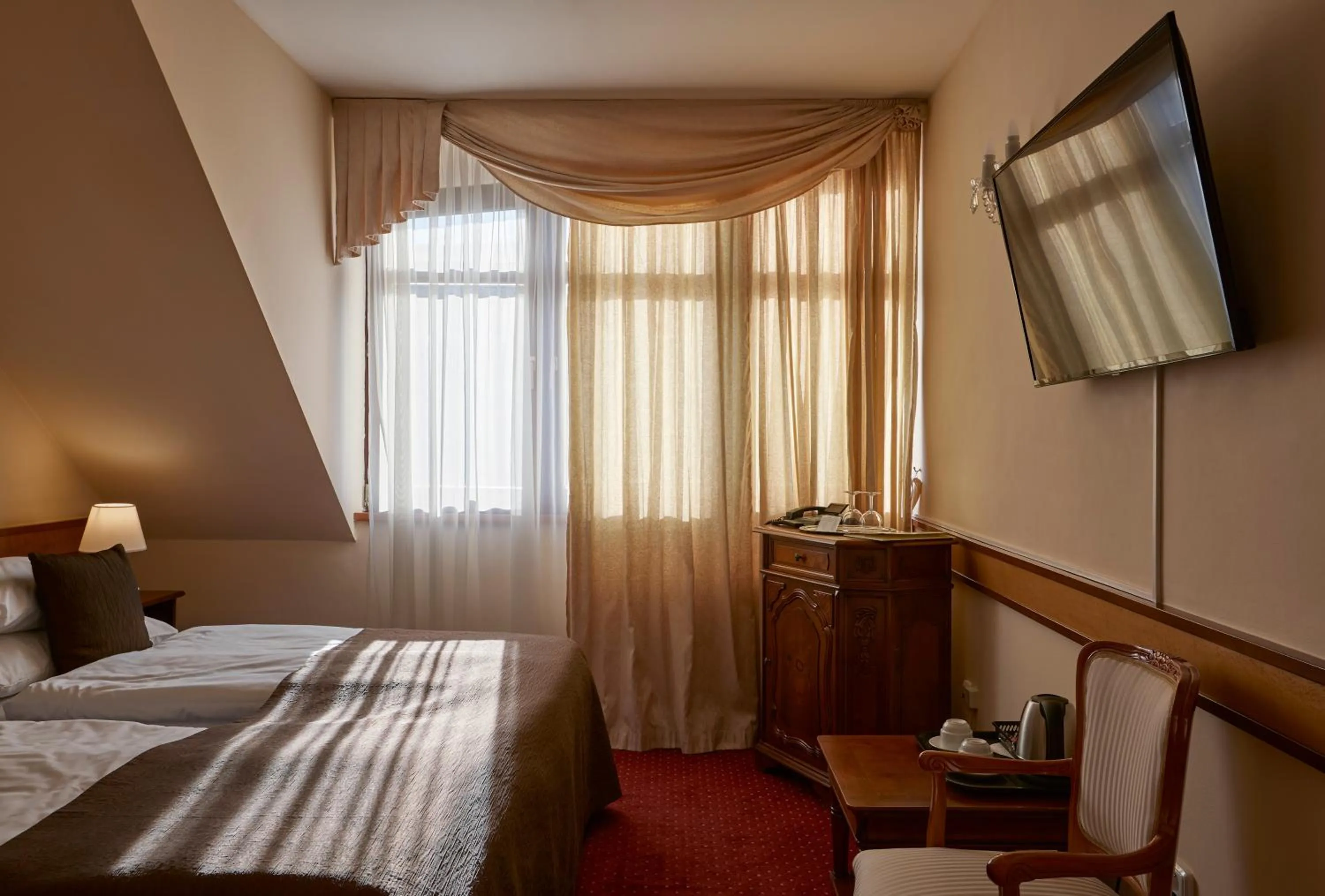 Bed in FLEUR DE LIS HOTEL