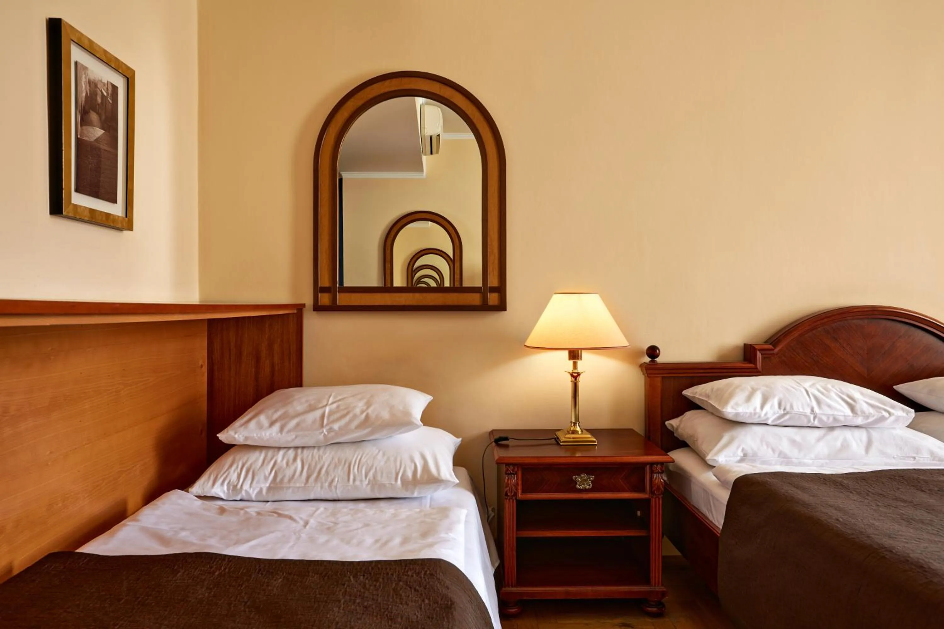 Bed in FLEUR DE LIS HOTEL