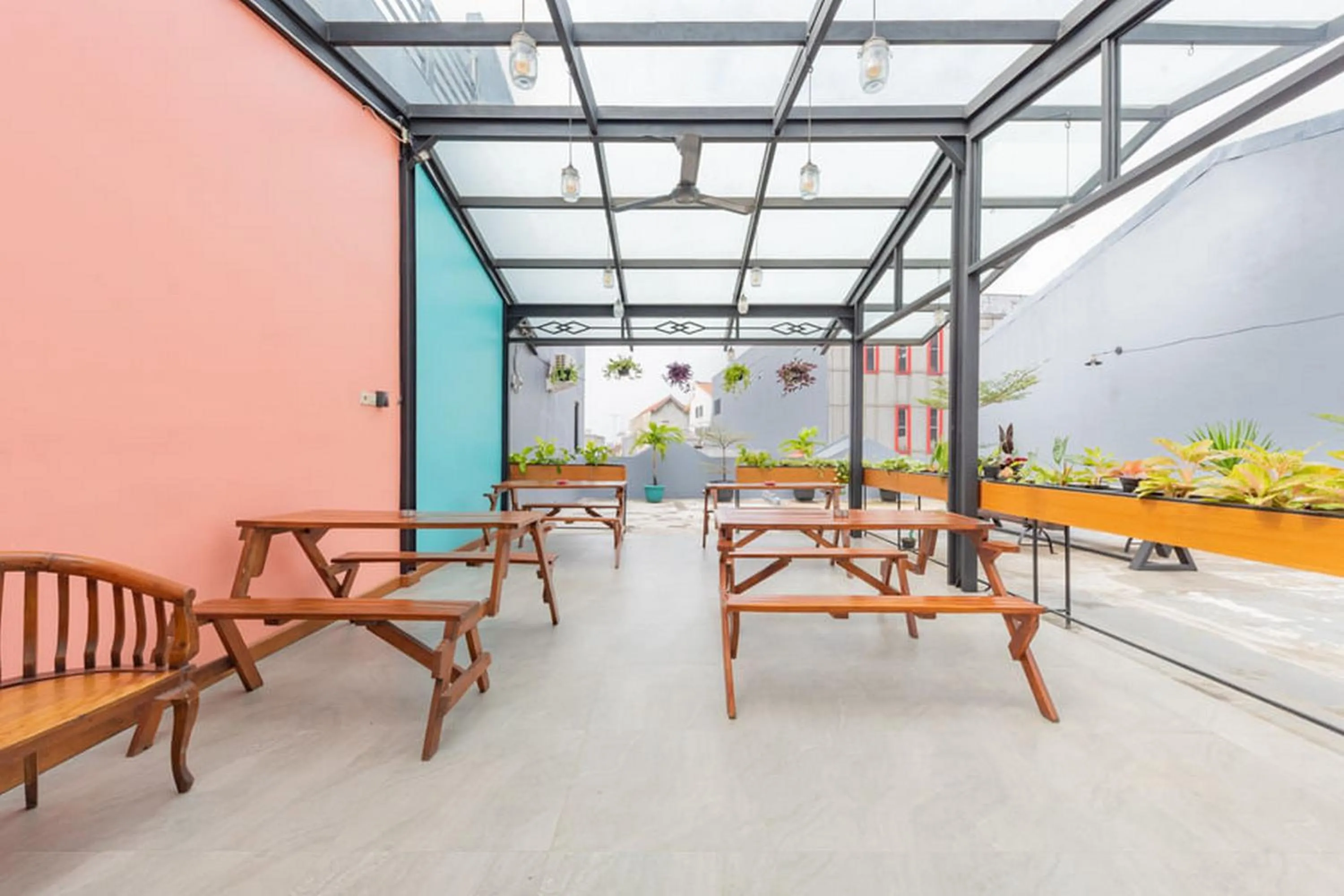 Seating area in Sans Hotel Suryakencana Bogor