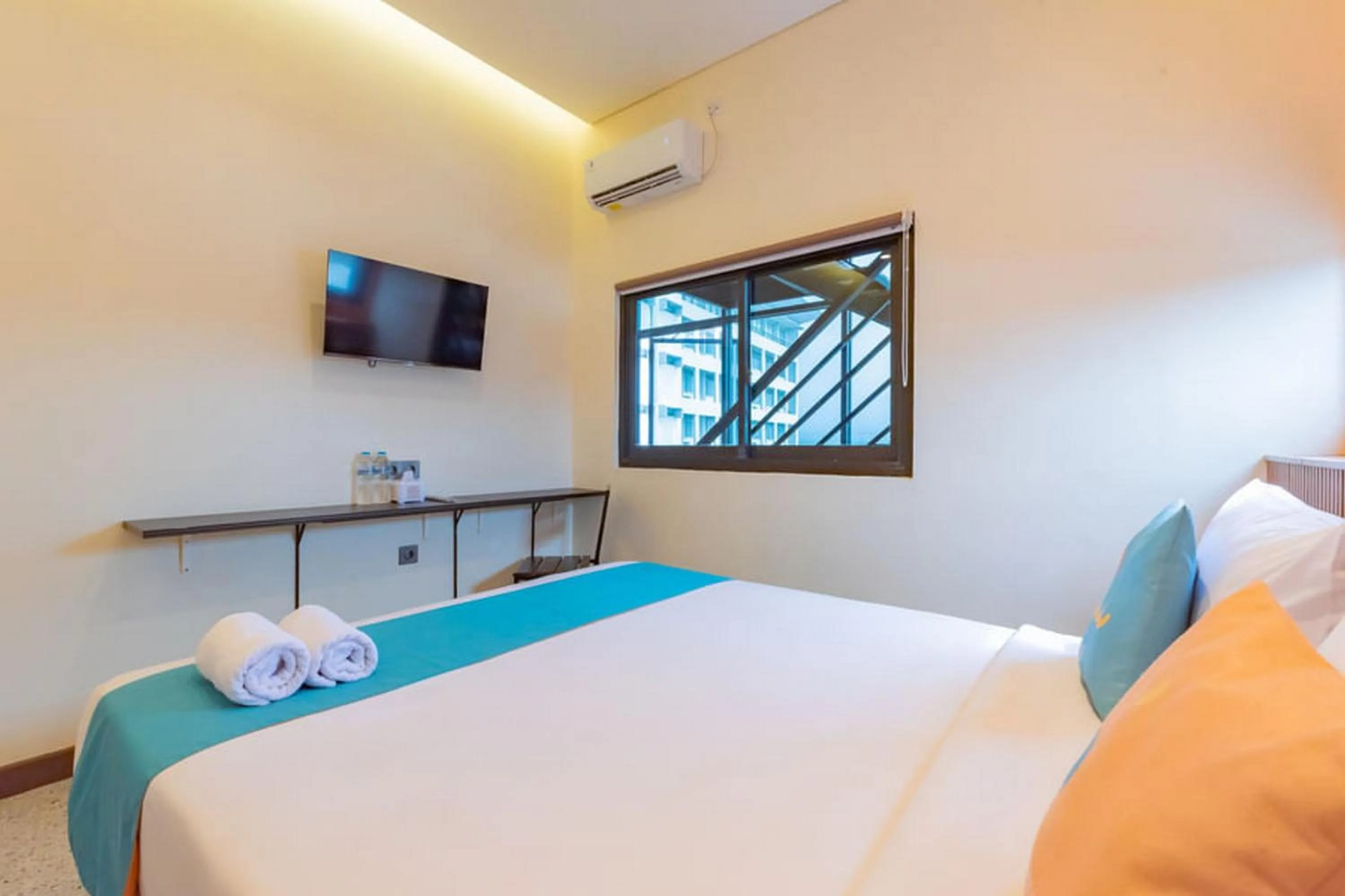 Bedroom, Bed in Sans Hotel Suryakencana Bogor