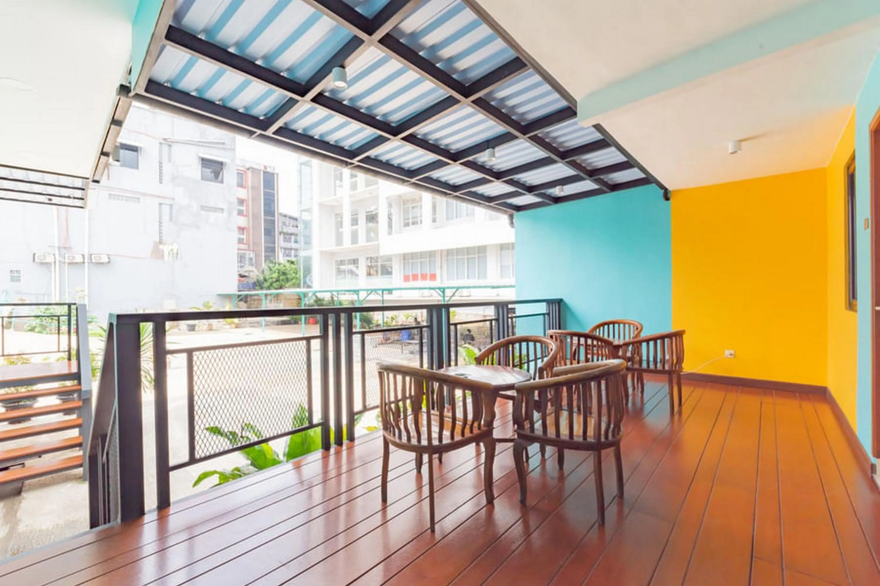 Seating area in Sans Hotel Suryakencana Bogor