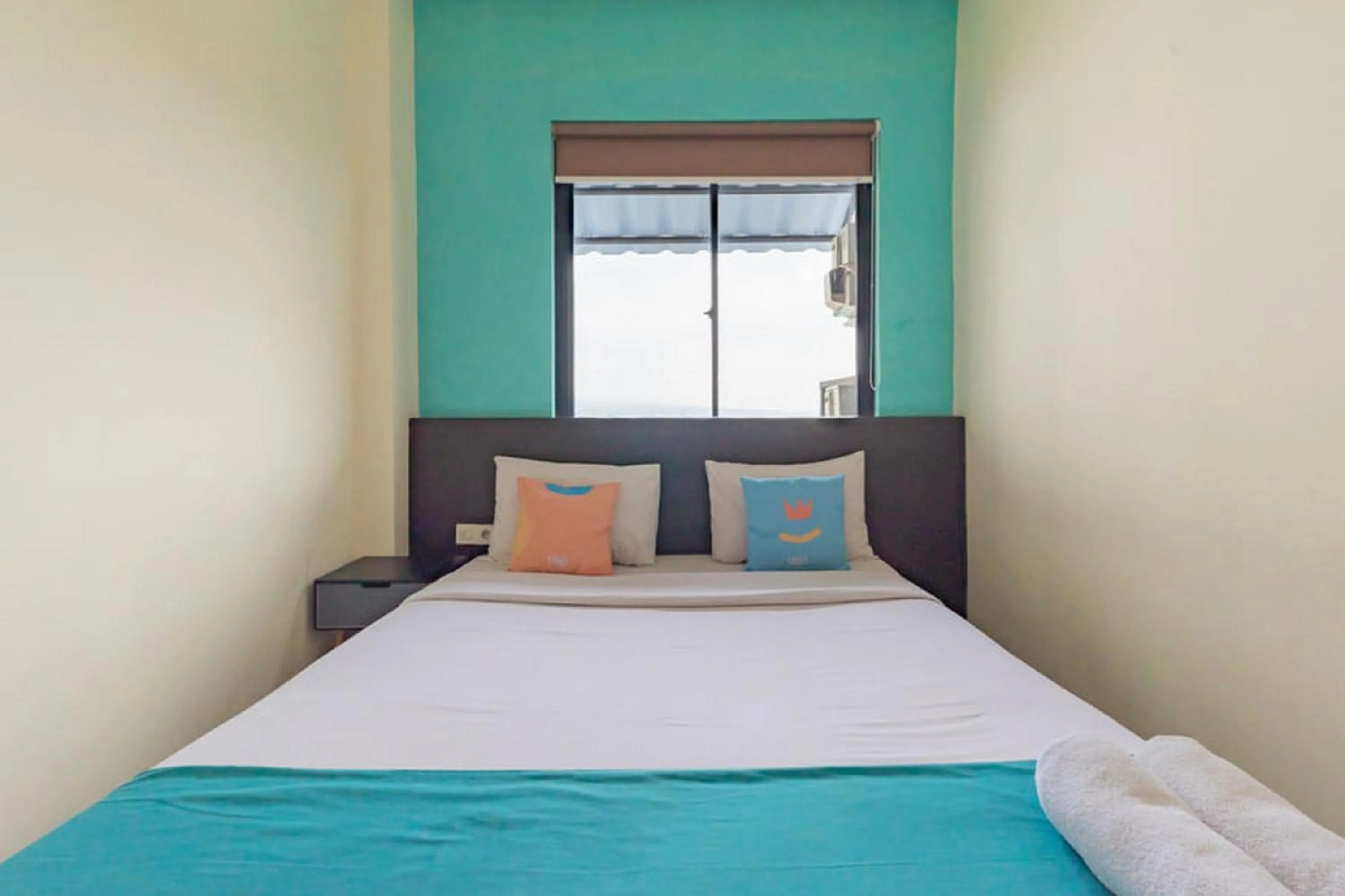 Bedroom, Bed in Sans Hotel Suryakencana Bogor