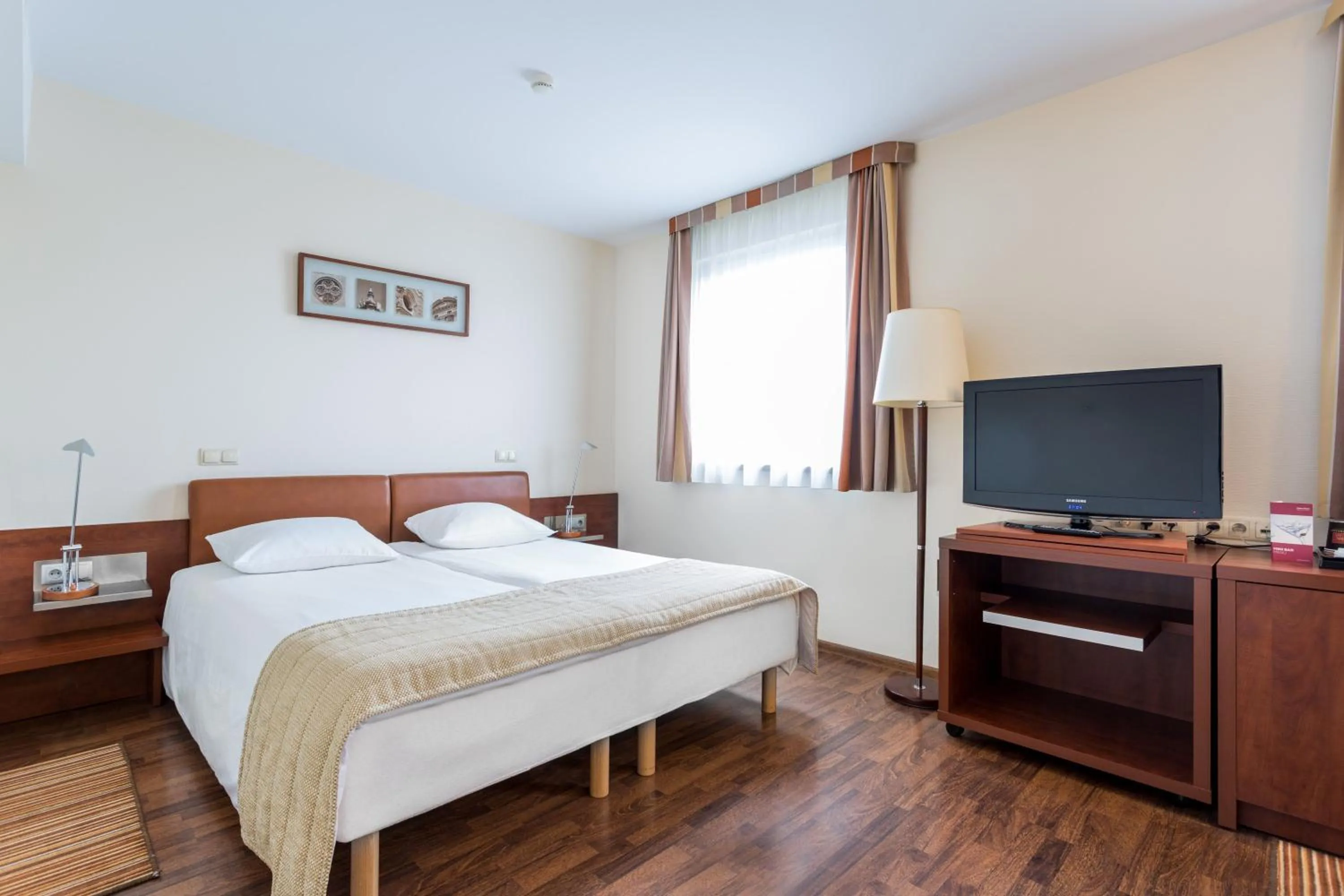 Bed in Qubus Hotel Gliwice