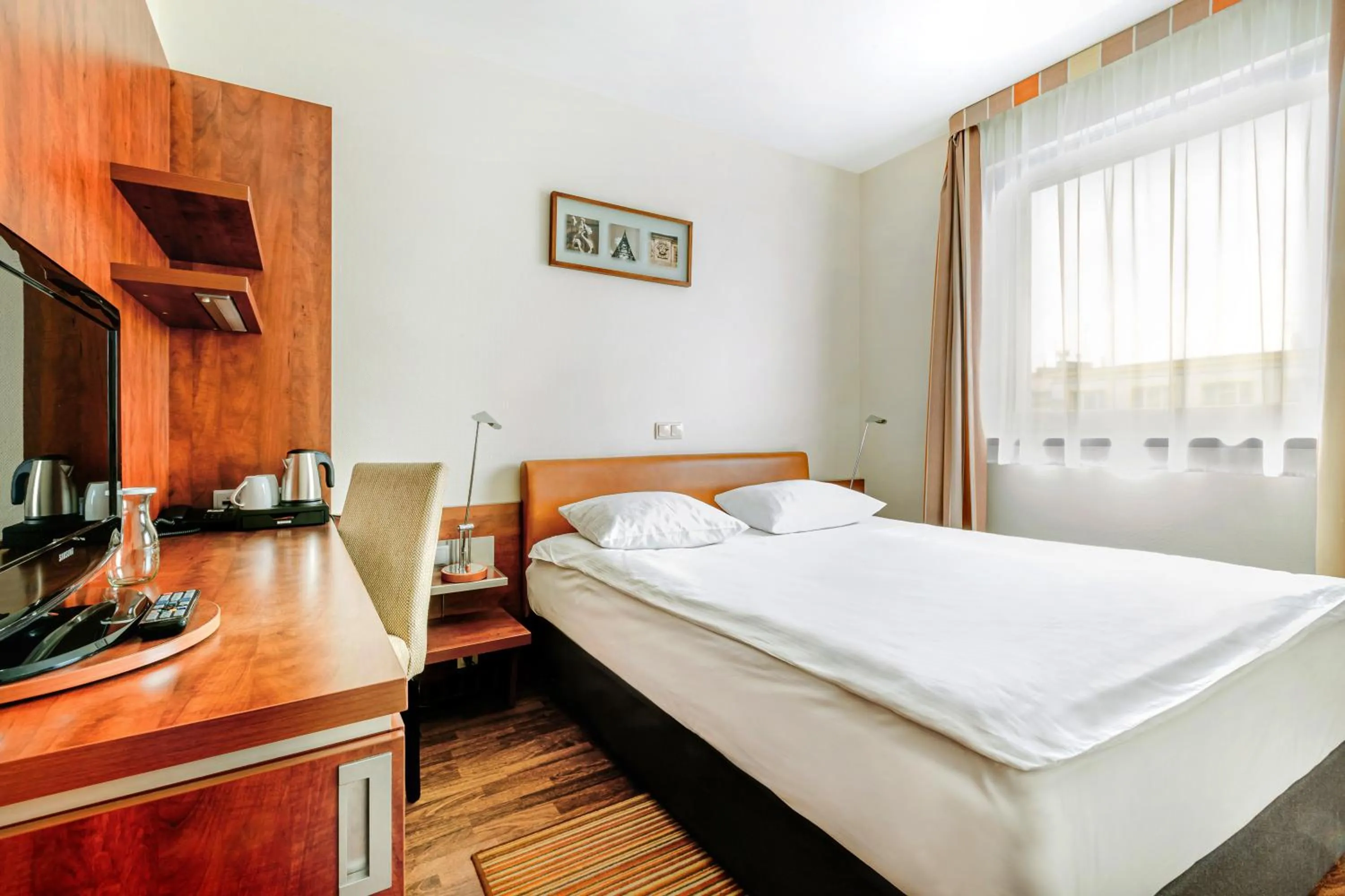Bed in Qubus Hotel Gliwice