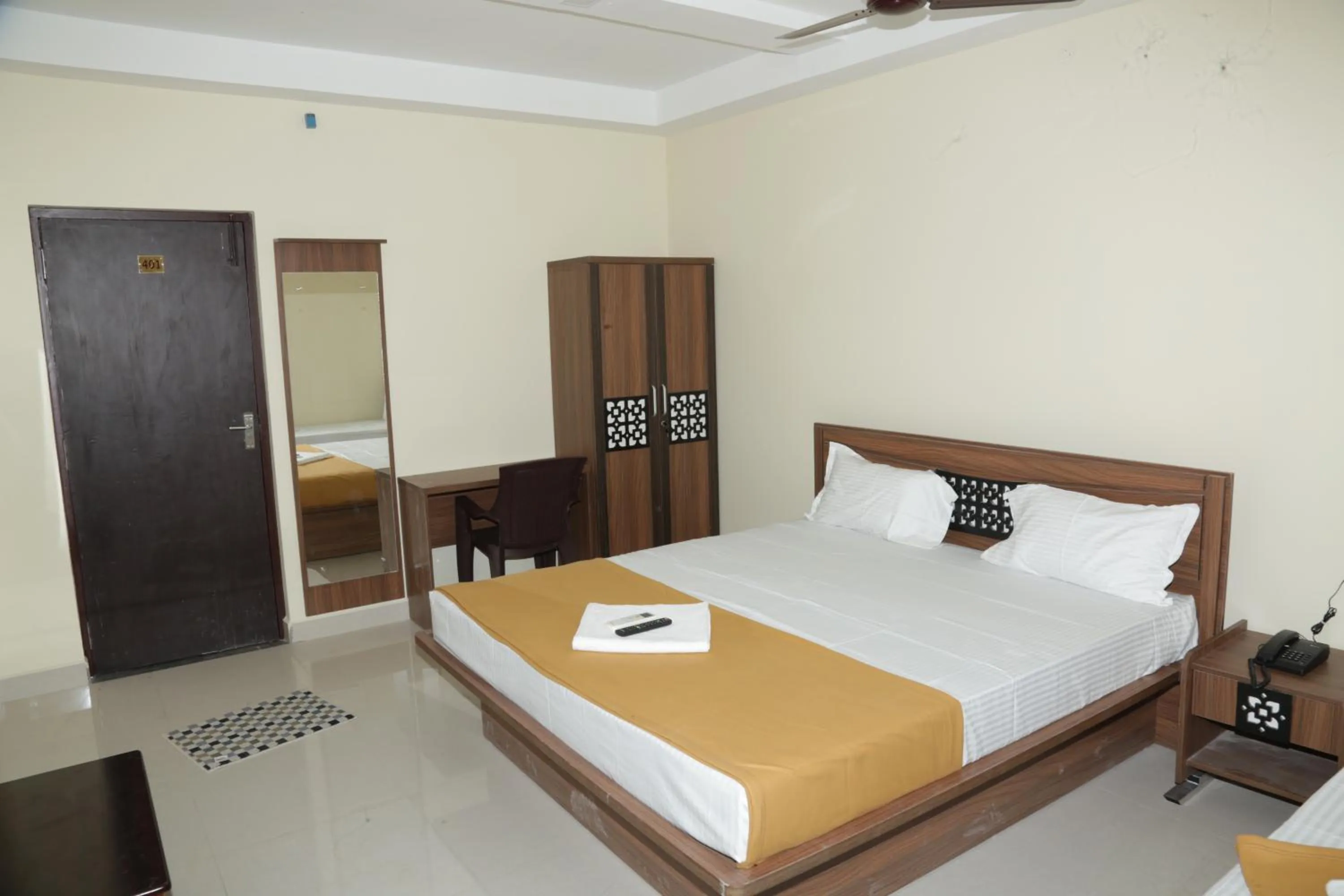 Photo of the whole room, Bed in Santhosh Inn