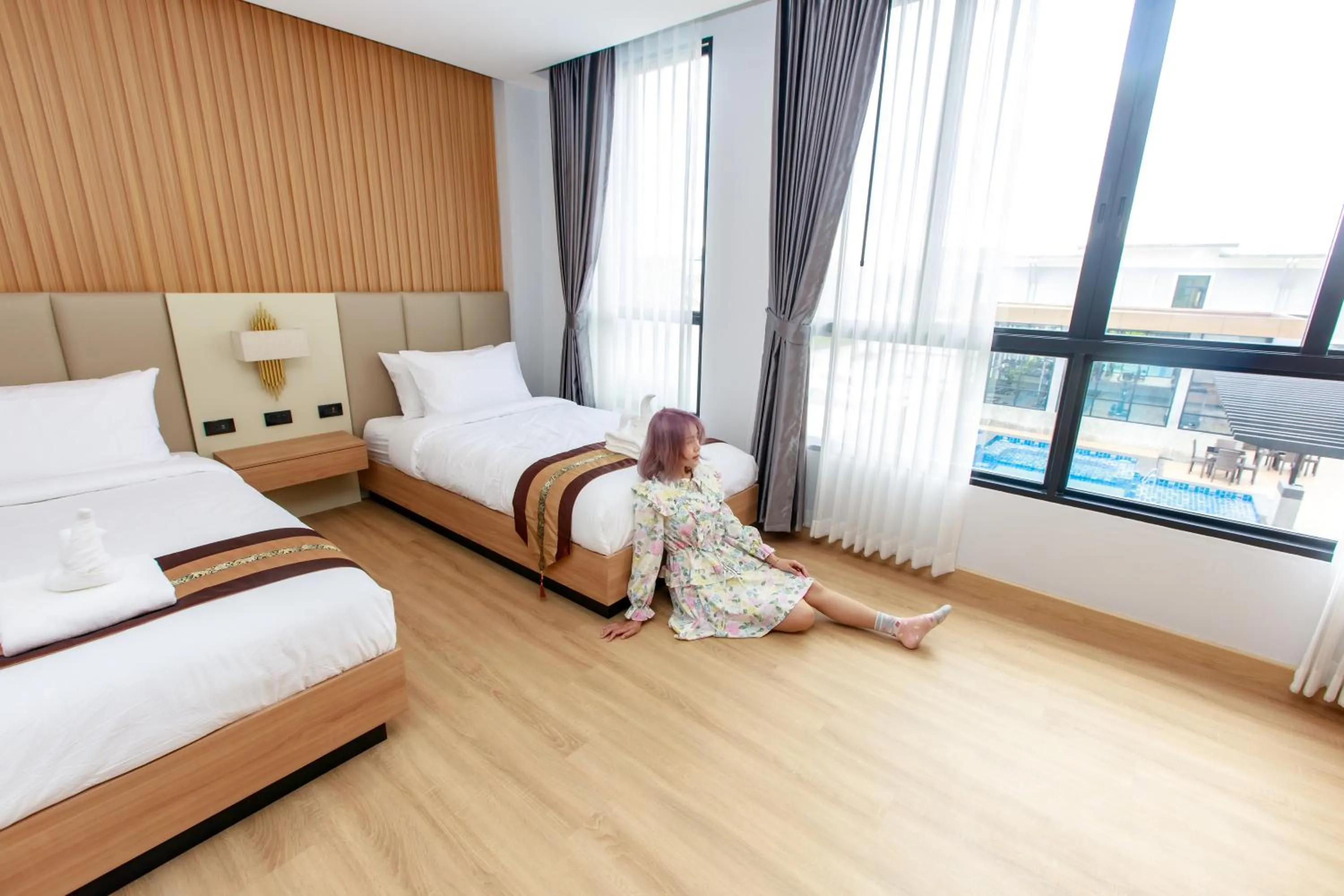 Photo of the whole room, Bed in Siri Hotel Lumphun