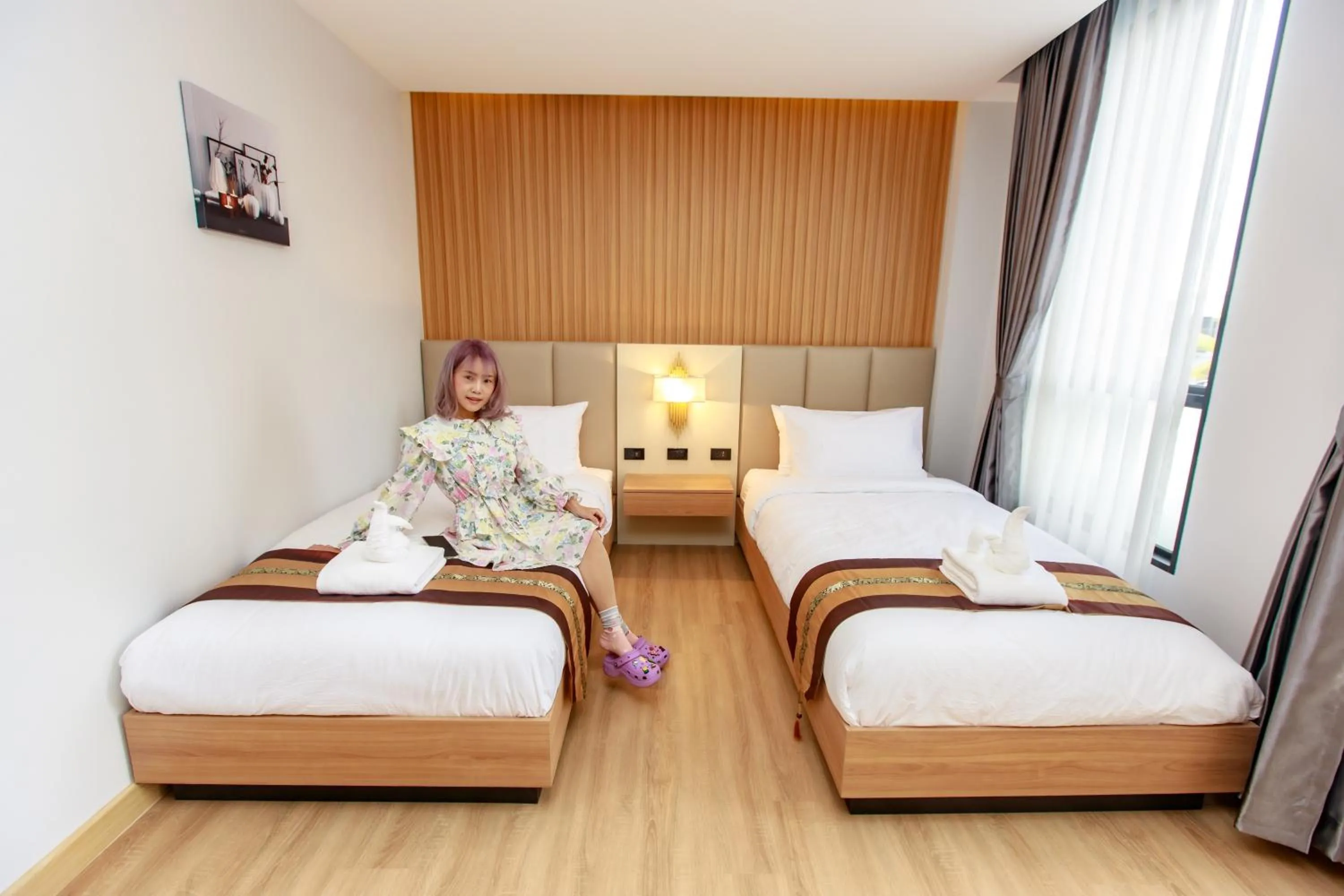 Photo of the whole room, Bed in Siri Hotel Lumphun