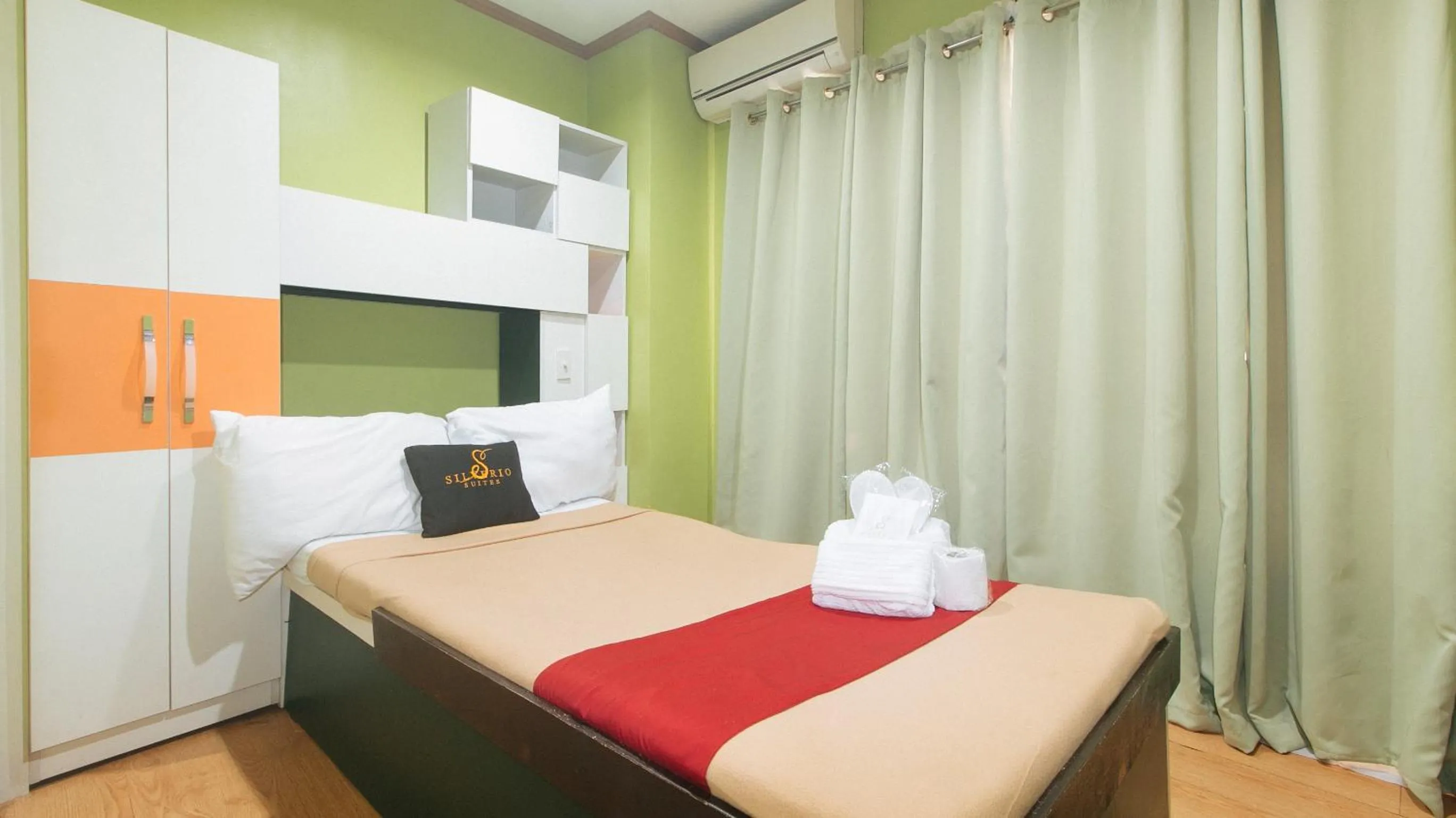 Bedroom, Bed in 153 Silverio Suites Betterliving Paranaque