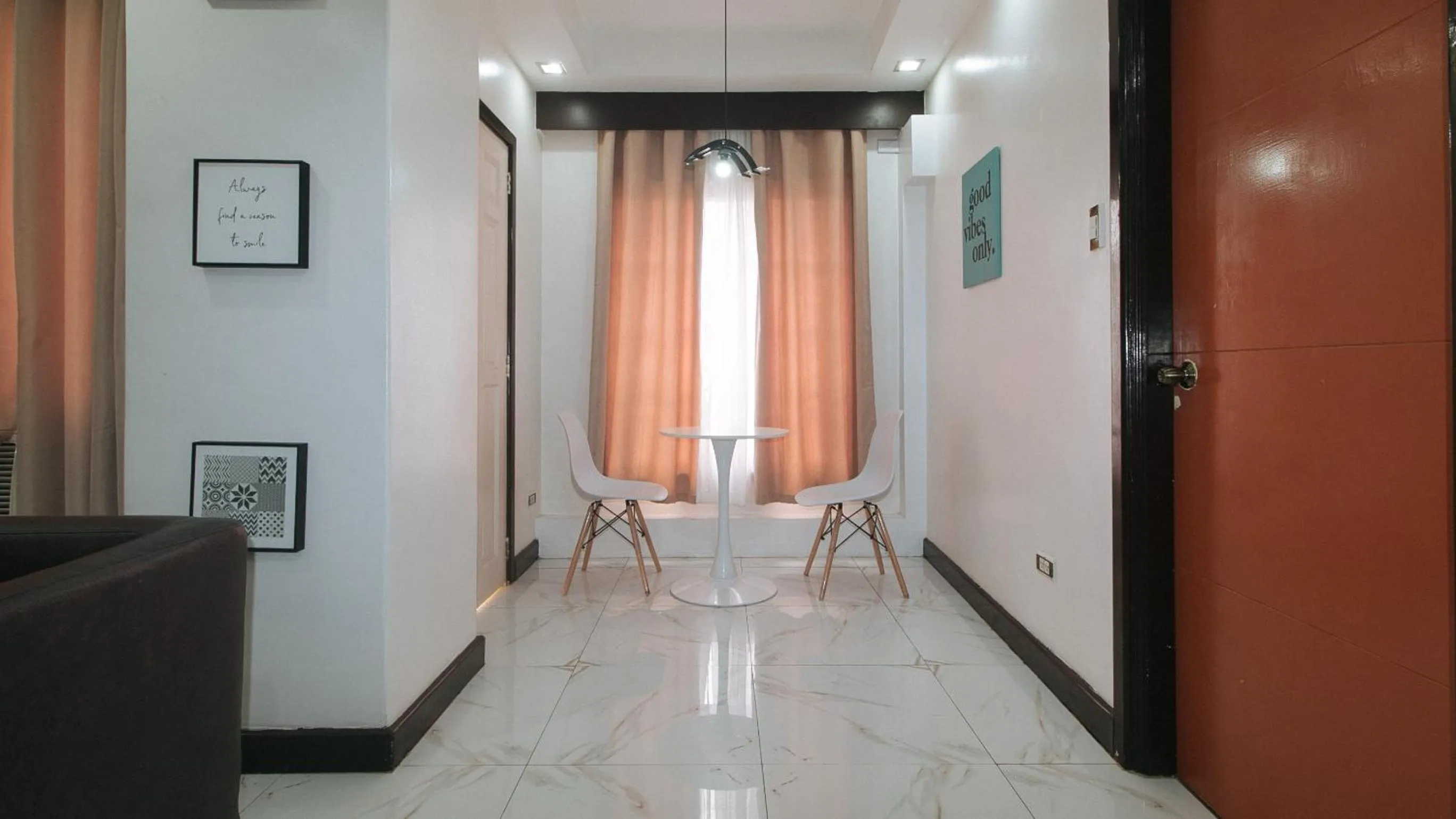 Seating area in 153 Silverio Suites Betterliving Paranaque