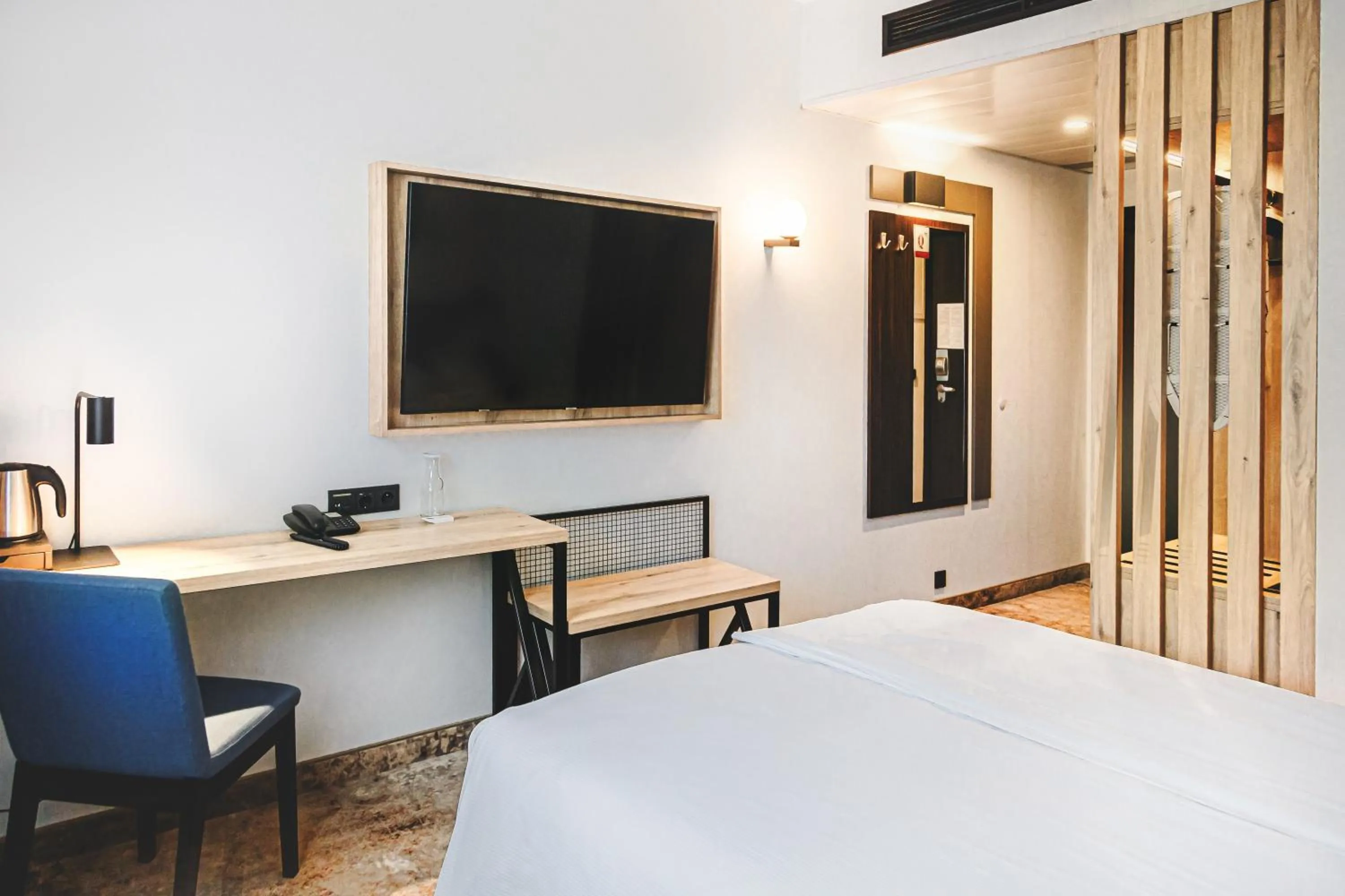 TV and multimedia, Bed in Qubus Hotel Łódź