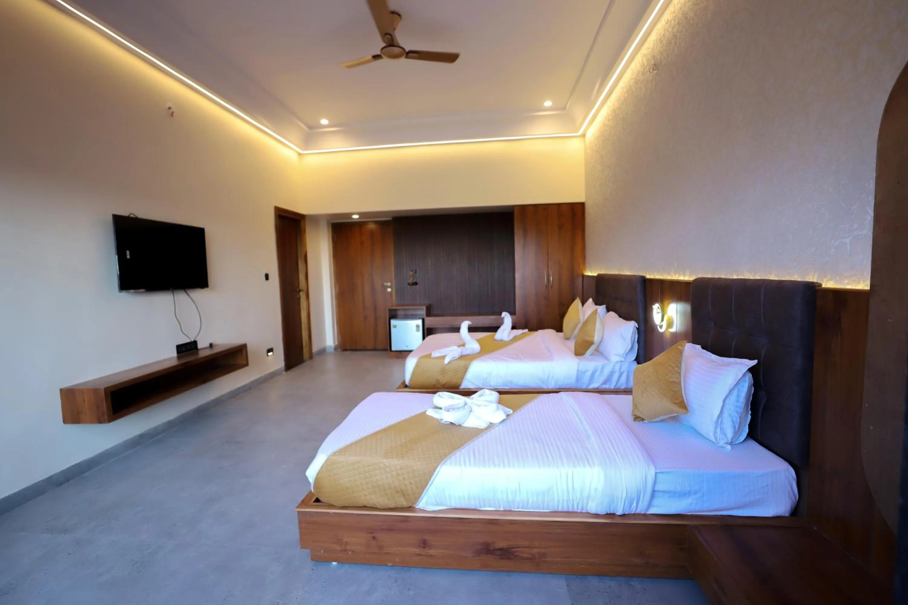 Communal lounge/ TV room, Bed in Nature Retreat Resorts- Life in Nature